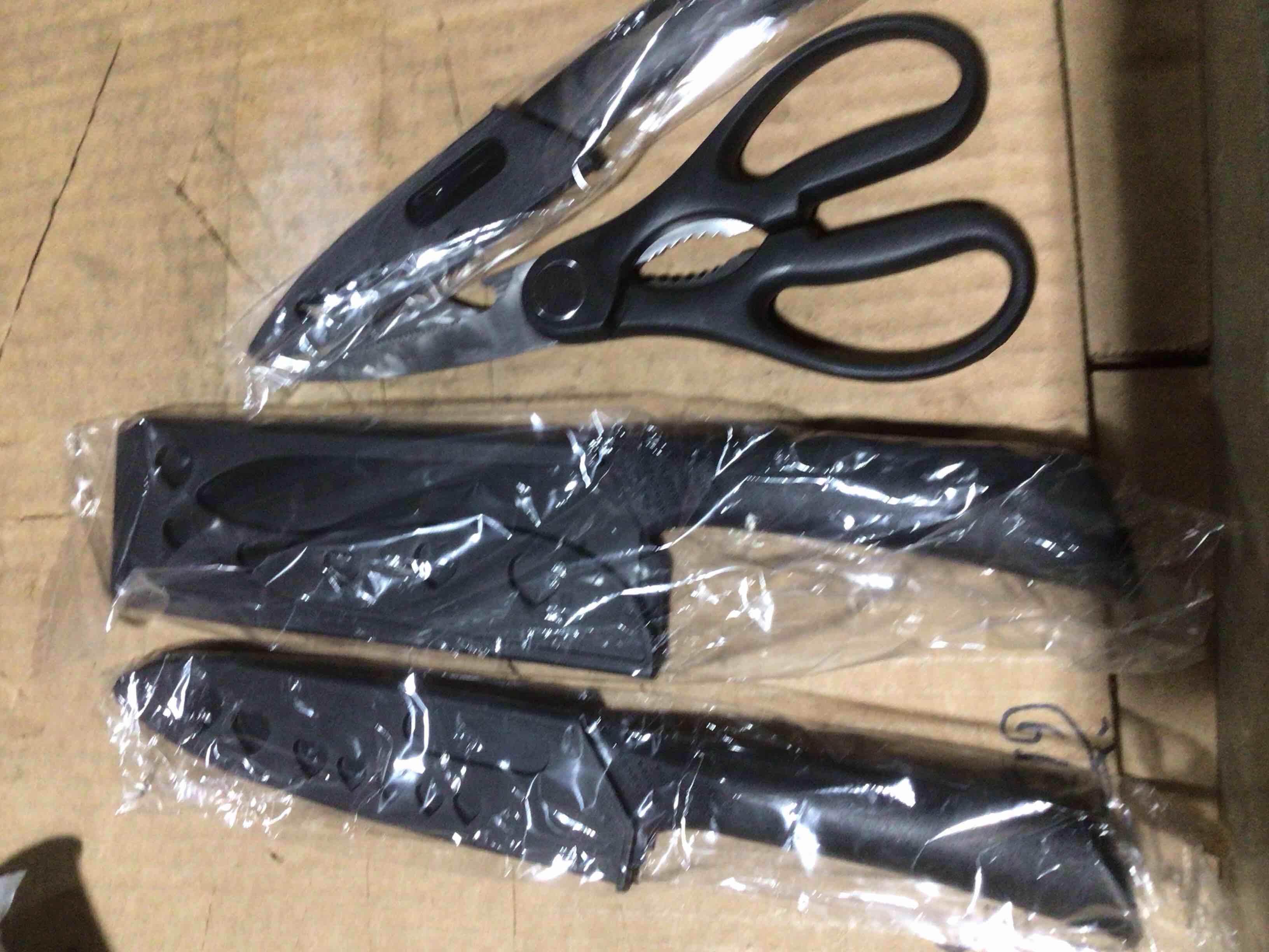 Condition photo showing New/Like New for 7 in 1 black stainless steel kitchen knife set, specialized blades & shears 