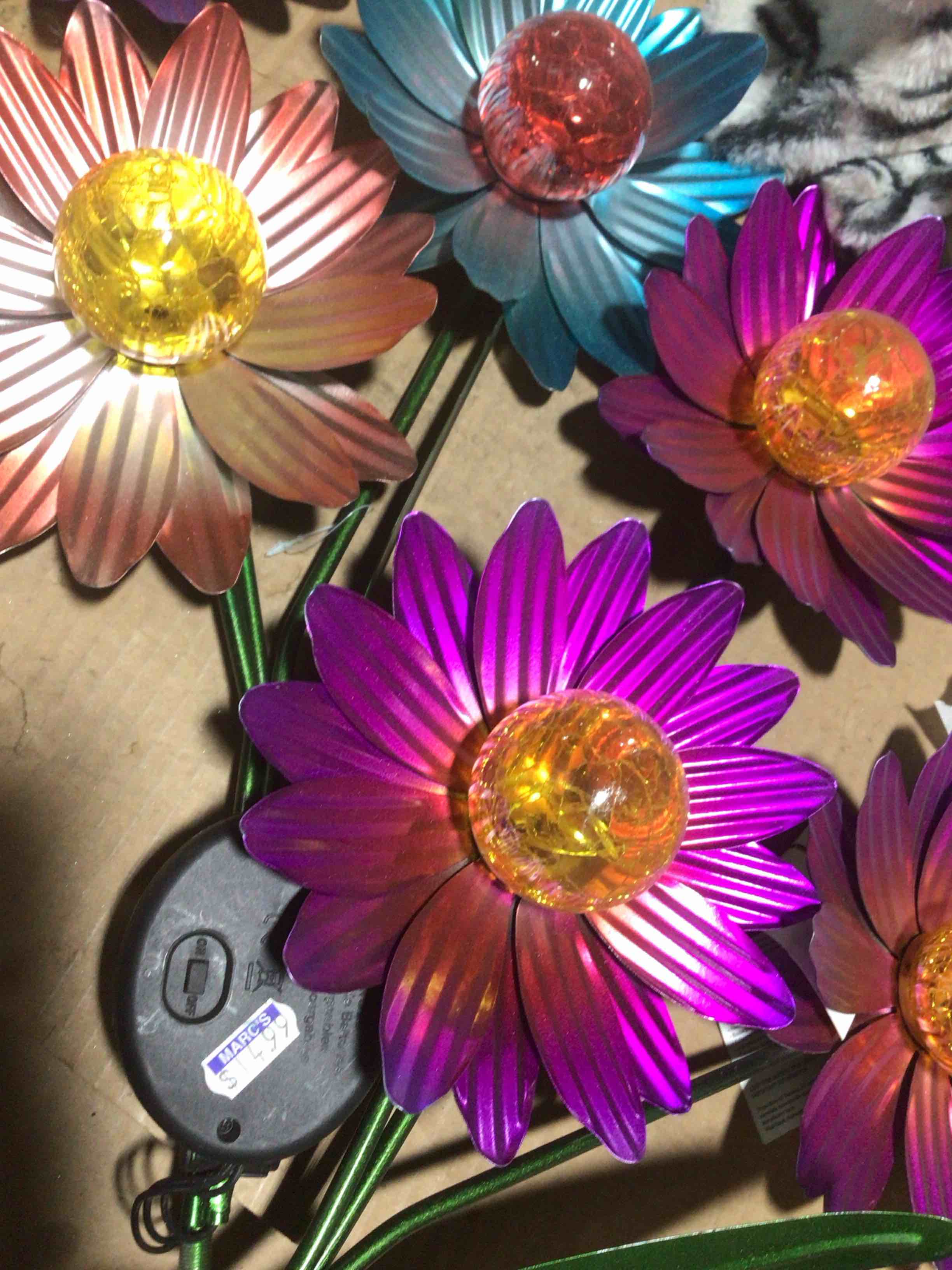 Condition photo showing New/Like New for solar lighted yard stake (flowers 