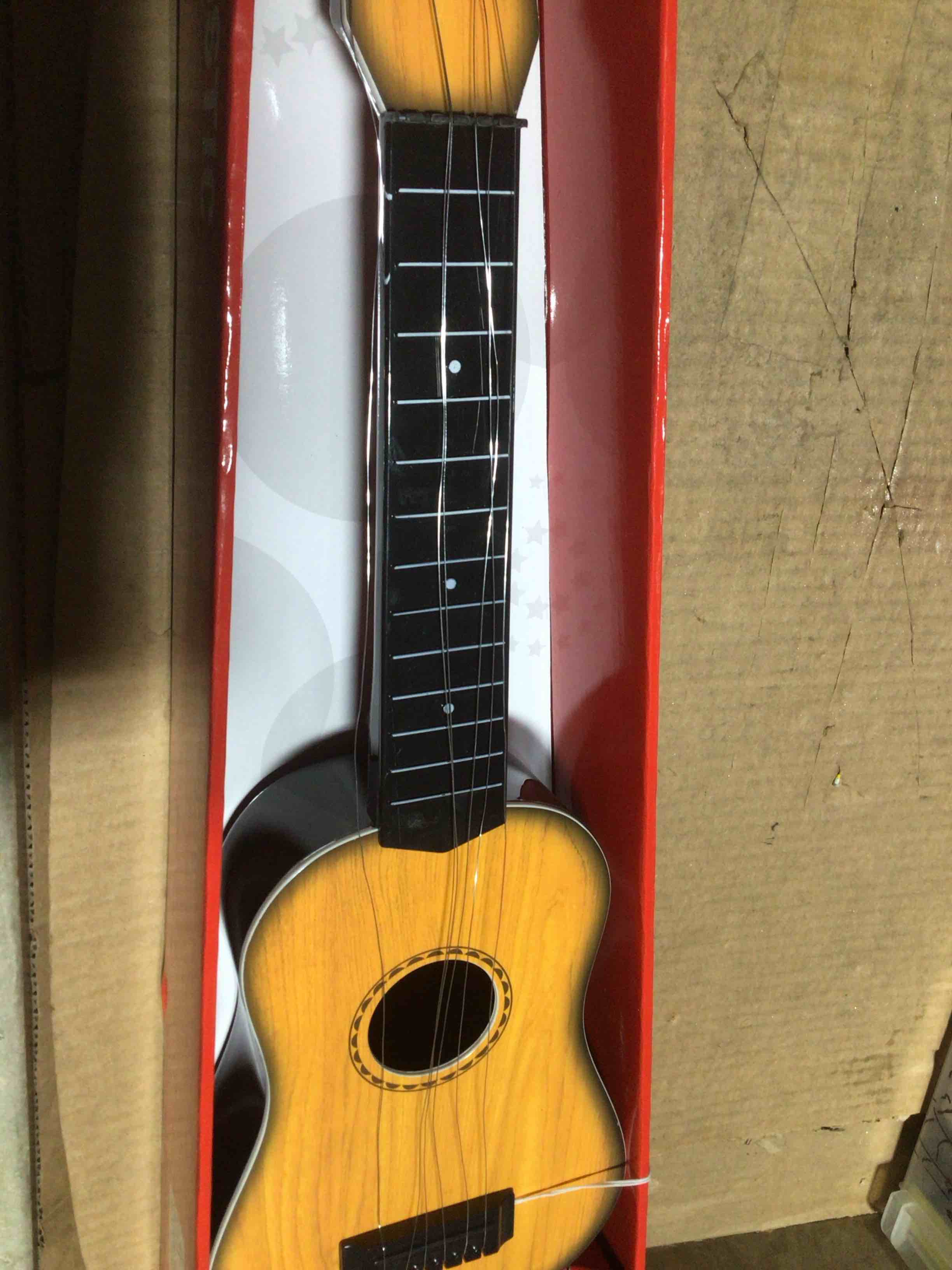 Condition photo showing New/Like New for Acoustic 23” guitar 