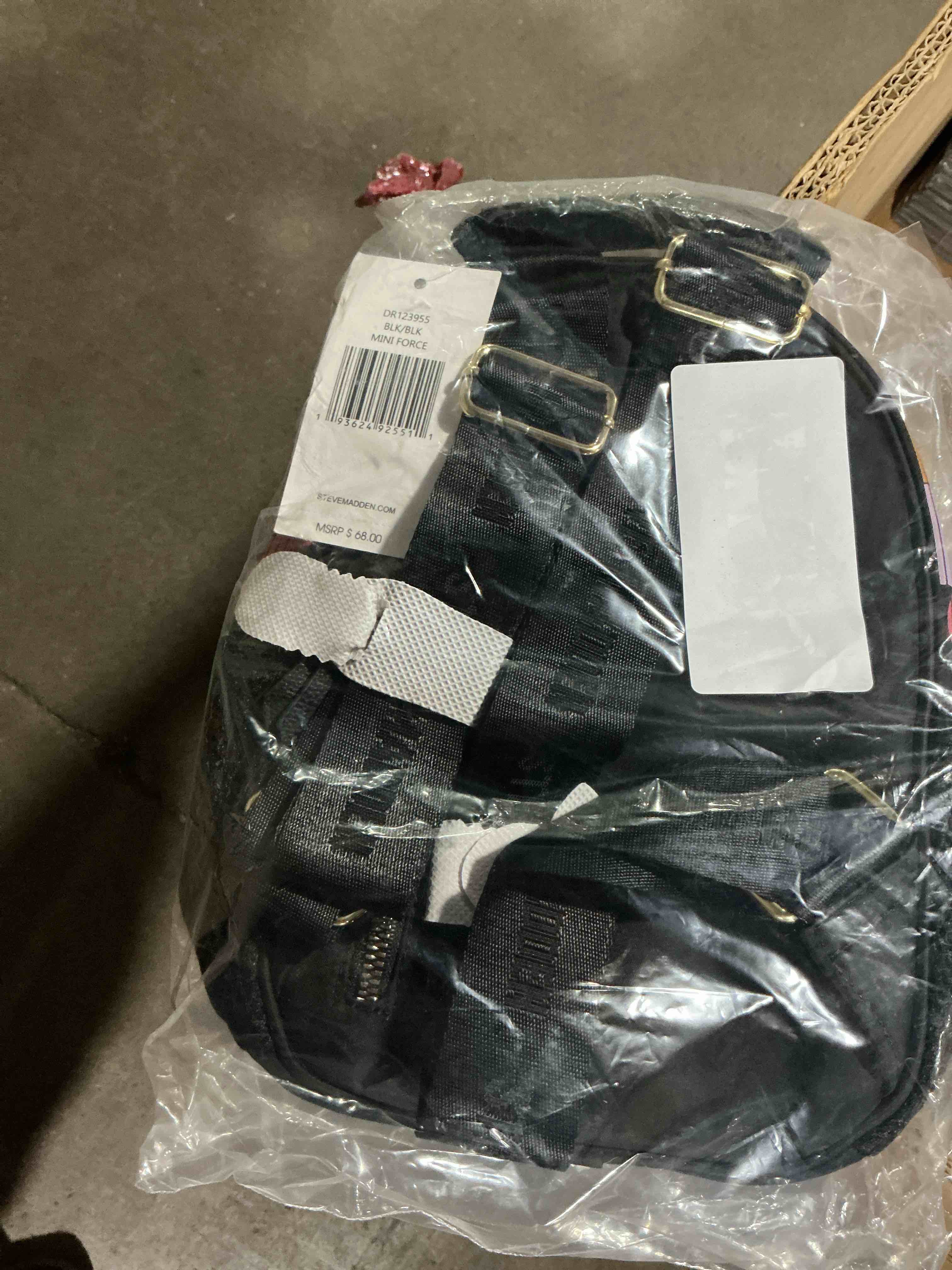 Condition photo showing item condition for Steve Madden mini Force black book bag