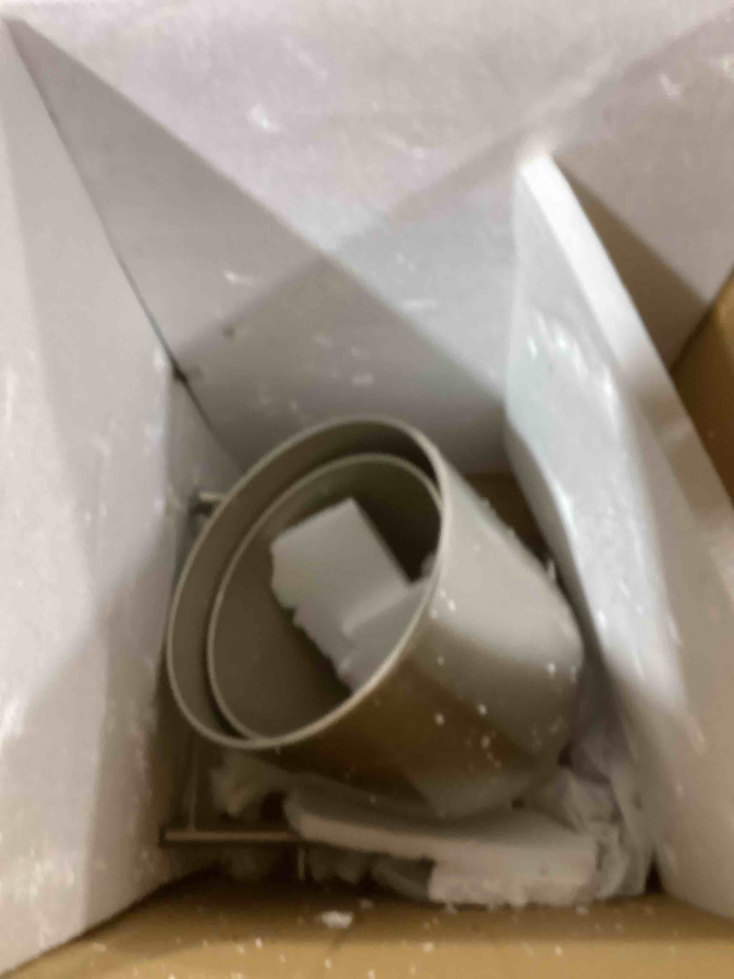 Silver plant pot with stand legs 