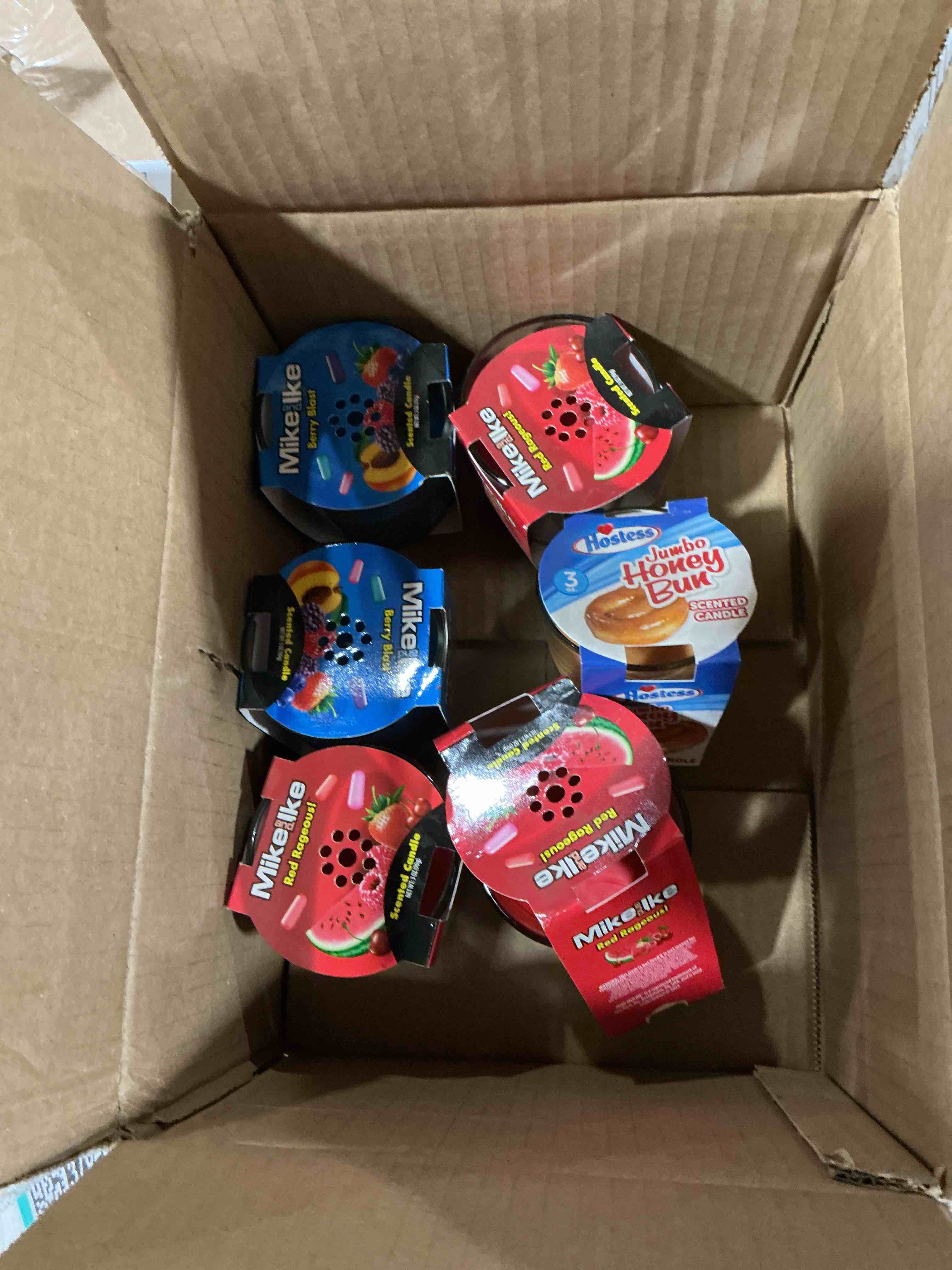 Condition photo showing As Is for pack of 6 hostess scented candle - scents vary 