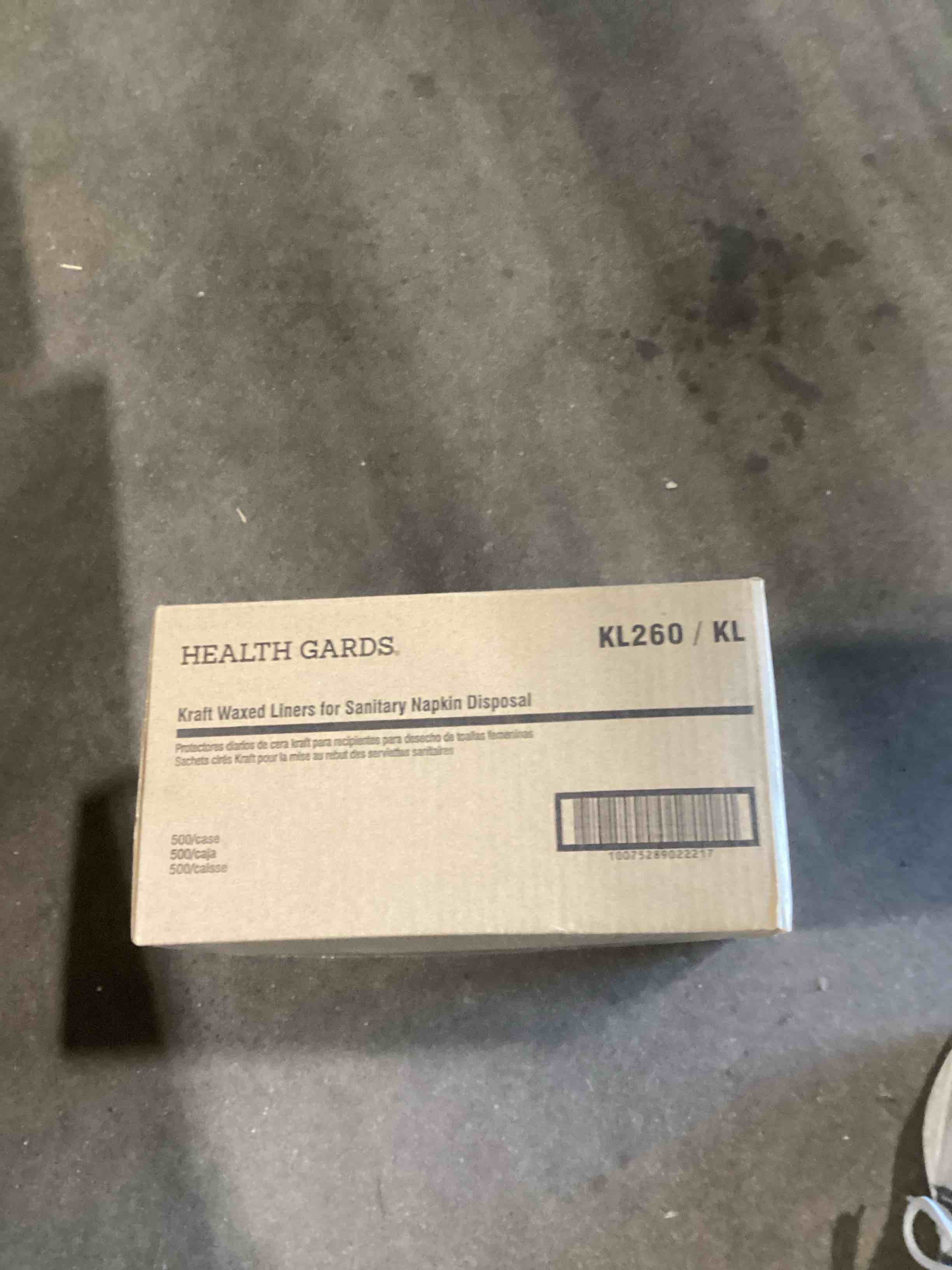 Condition photo showing Good Condition for liner, wax kraft paper for sanitary receptacle, 500