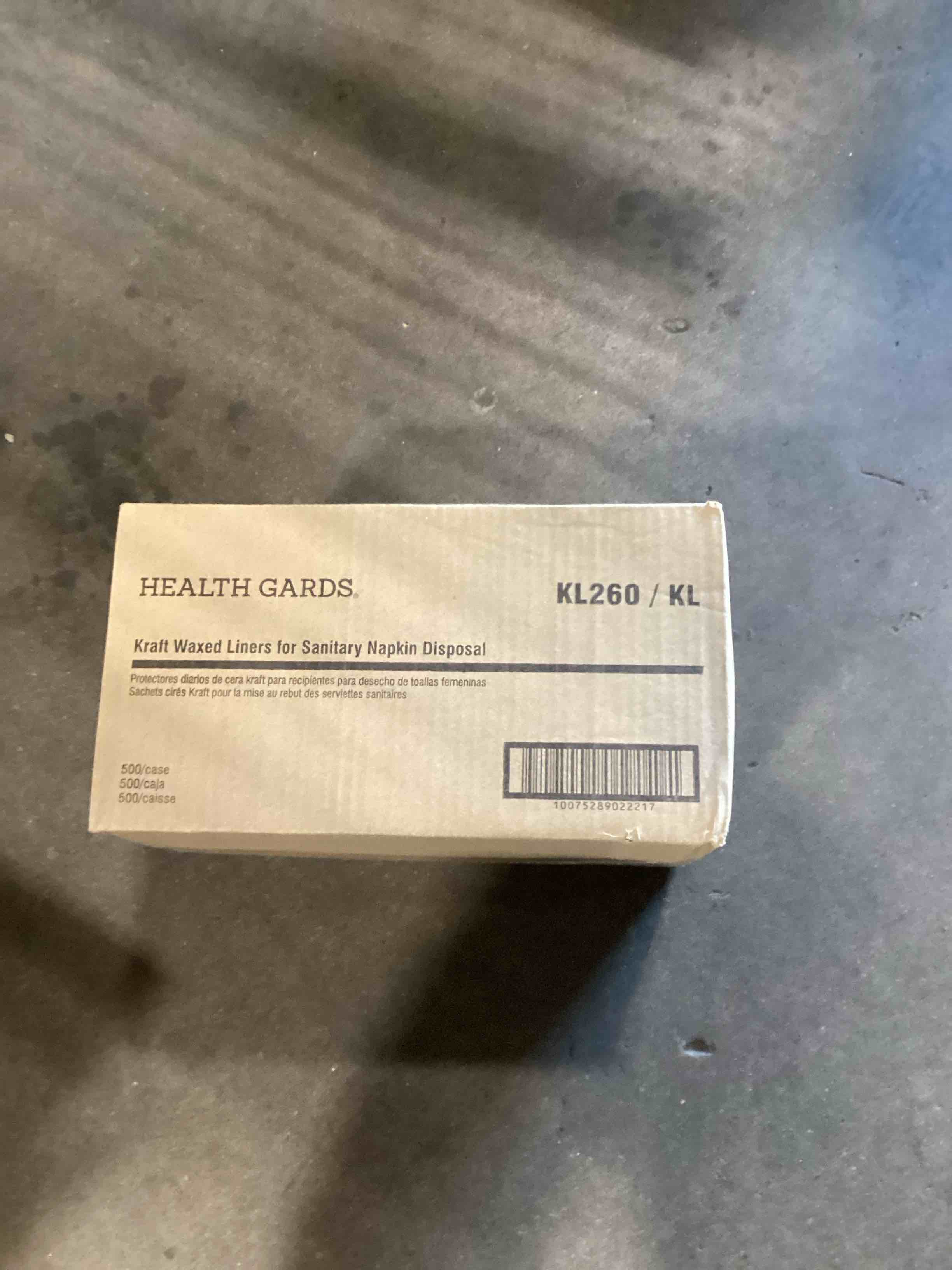 Condition photo showing Good Condition for liner, wax kraft paper for sanitary receptacle, 500
