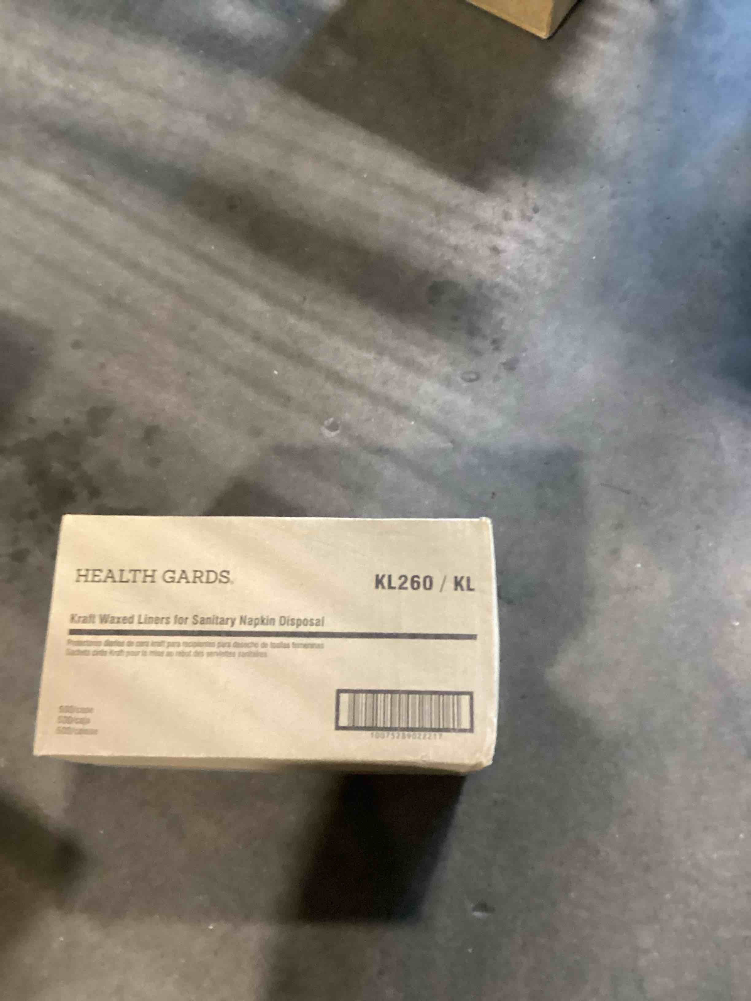 Condition photo showing Good Condition for liner, wax kraft paper for sanitary receptacle, 500