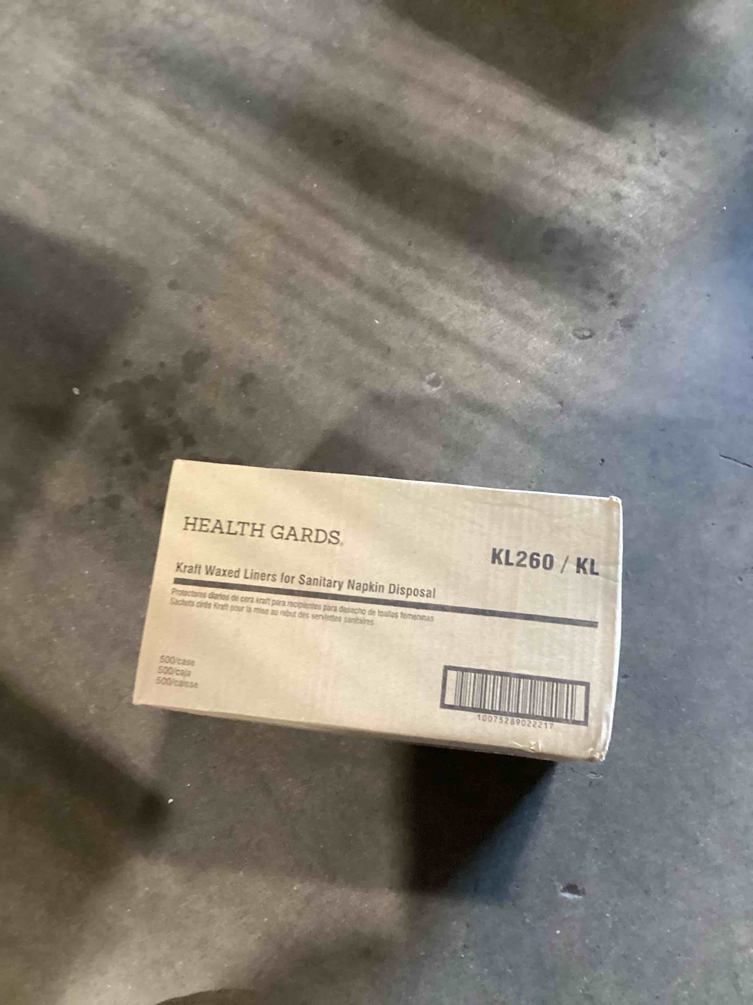 Condition photo showing Good Condition for liner, wax kraft paper for sanitary receptacle, 500