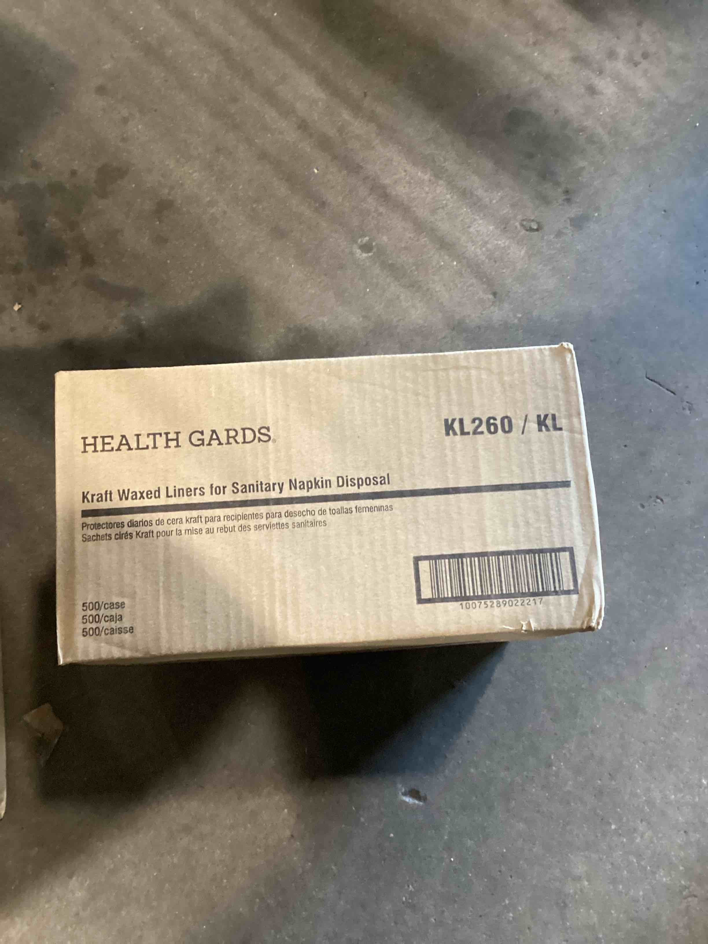 Condition photo showing Good Condition for liner, wax kraft paper for sanitary receptacle, 500