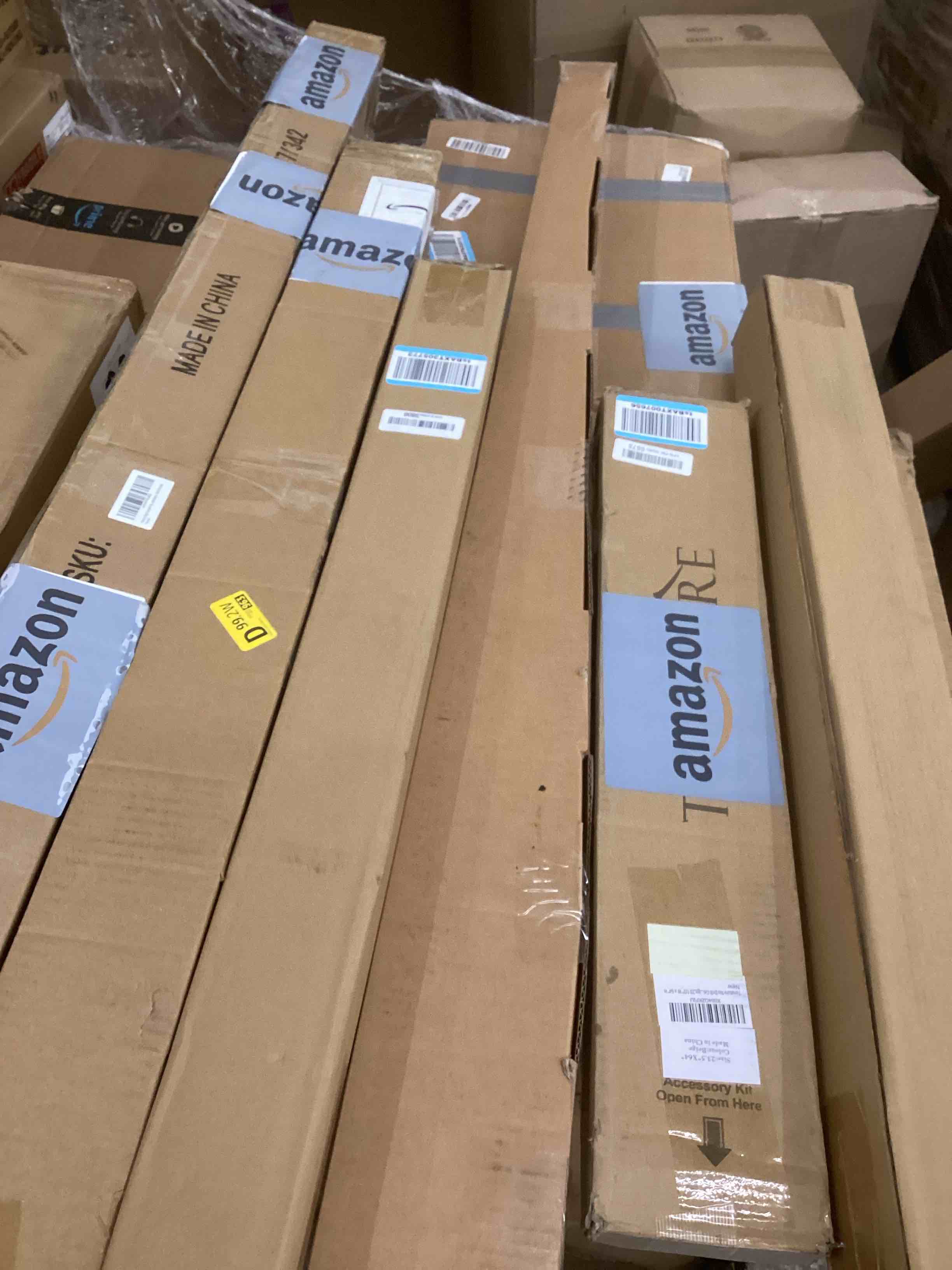 assorted curtain rods and window blinds 