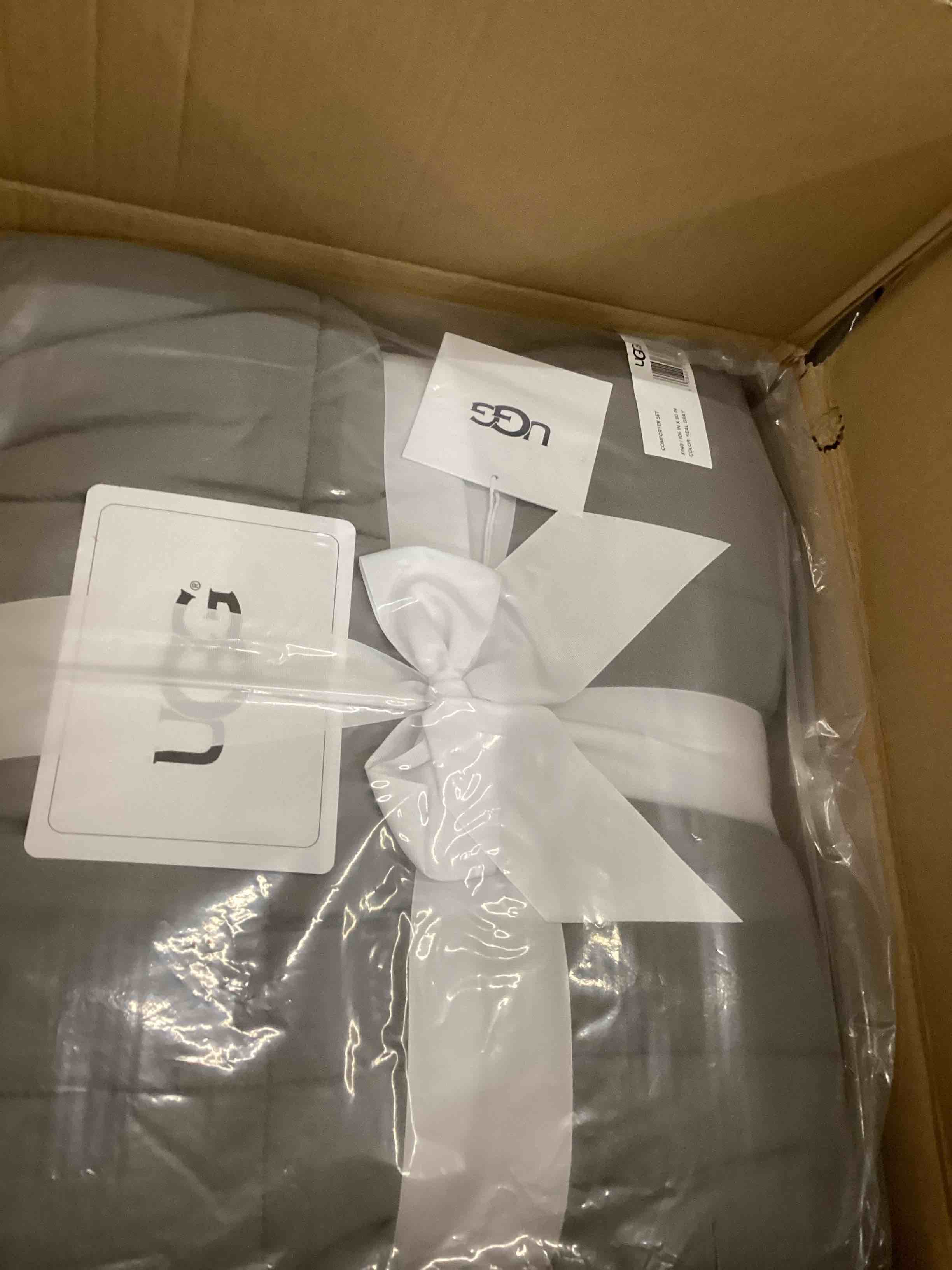 Condition photo showing New/Like New for UGG Leonora Comforter Set with 2 Pillow Shams Lightweight Down Alternative Blanket Reversible Cozy Warm All Season Washable and Hypoallergenic Bedding Set, King, Light Grey Light Grey King