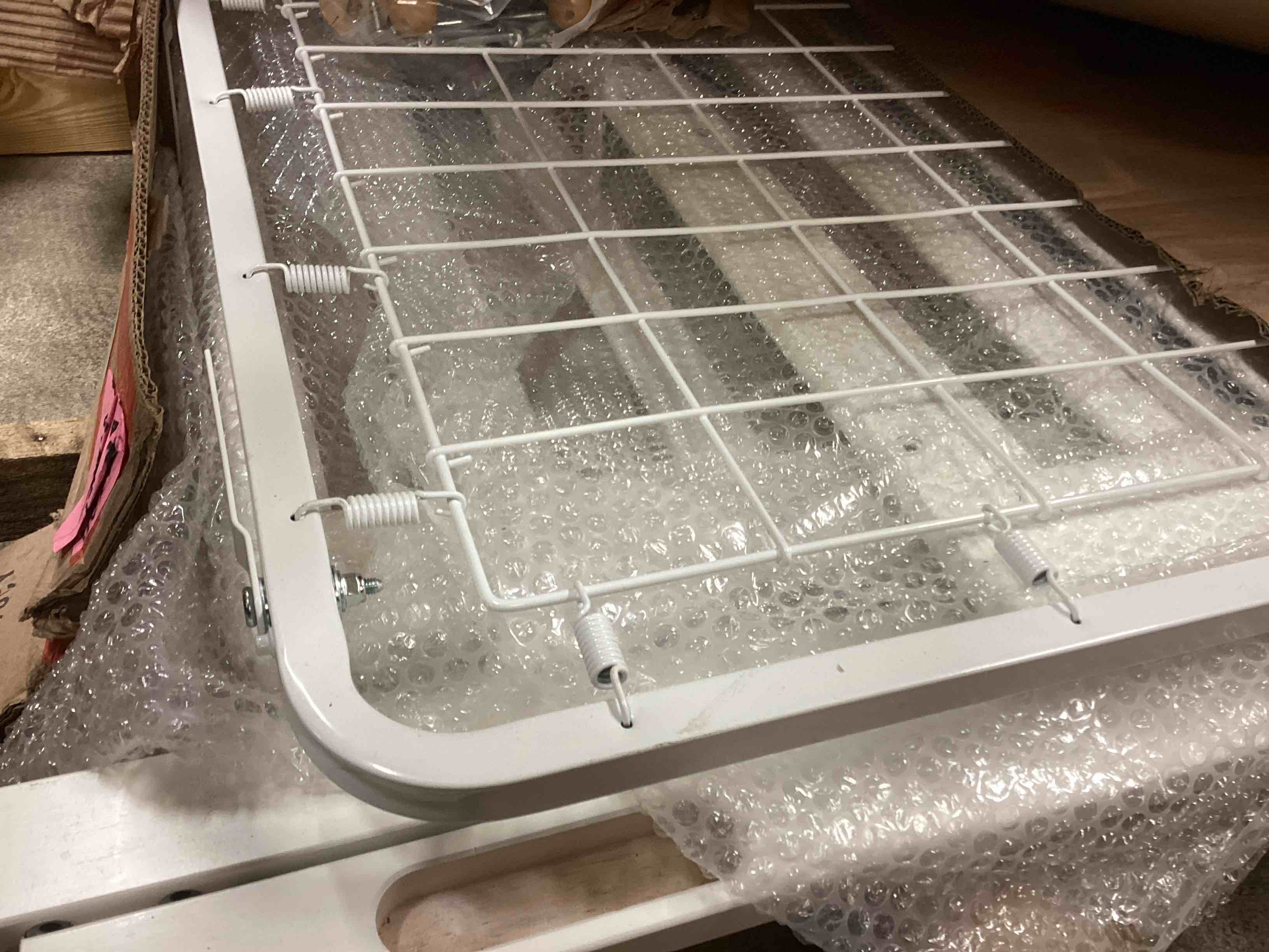 Condition photo showing As Is for Delta Children Essex 4-in-1 Convertible Baby Crib, Bianca White with Natural Legs Crib Bianca White (incomplete) 