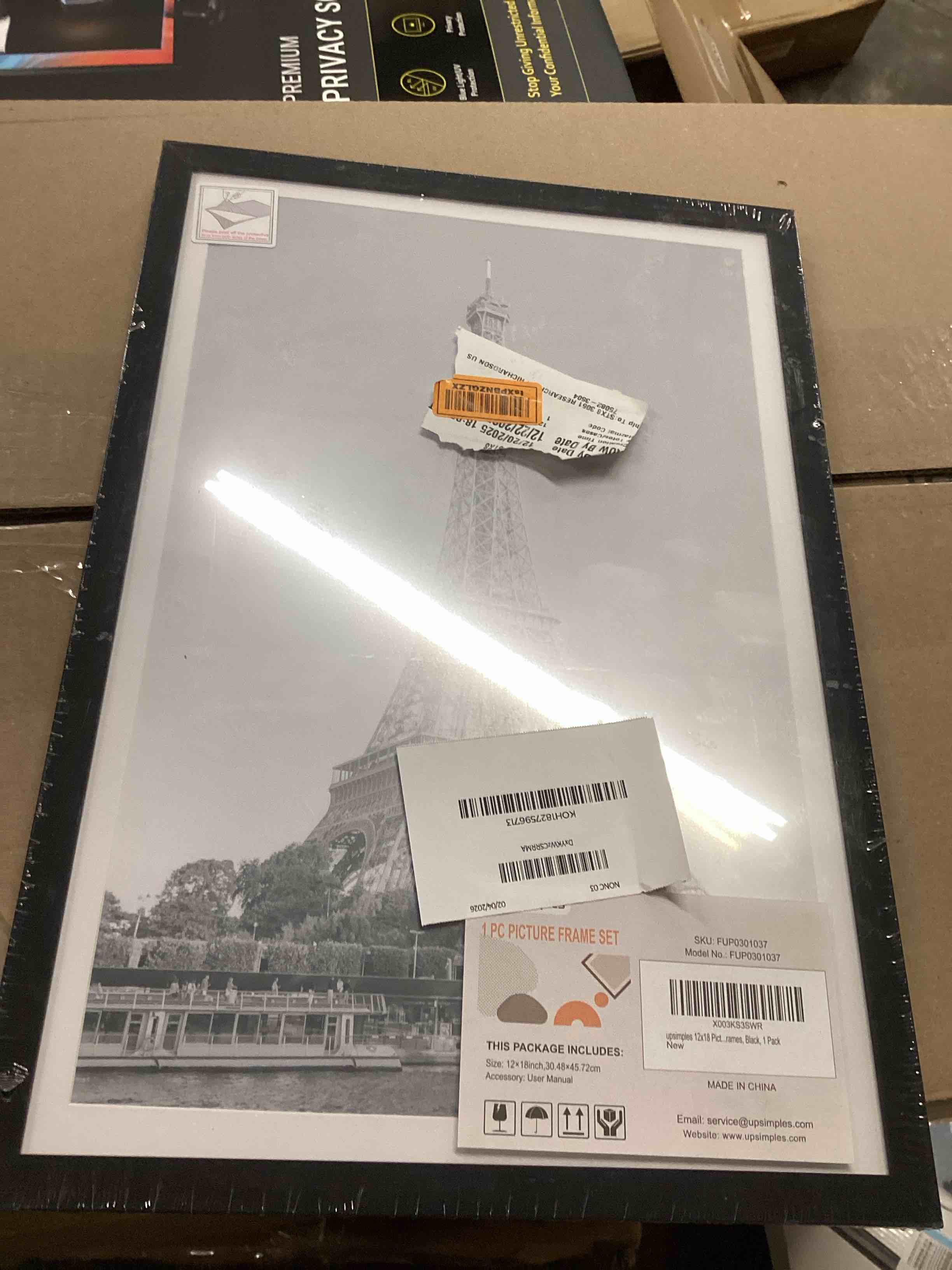 Condition photo showing New/Like New for upsimples 12x18 Picture Frame, Display Pictures 11x17 with Mat or 12 x 18 Without, Wall Hanging Poster Frames, Black, 1 Pack Black 12x18