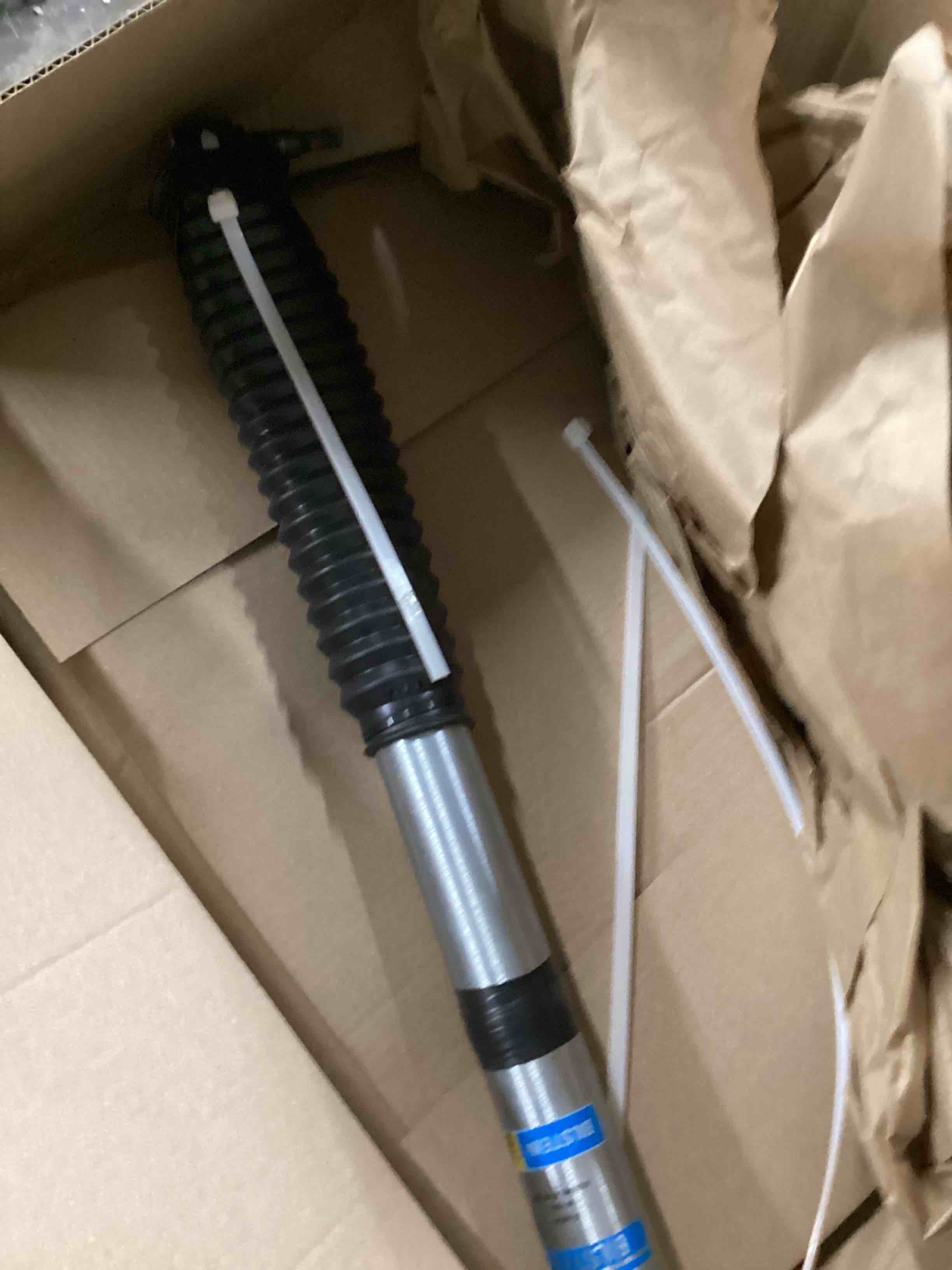 Condition photo showing As Is for Bilstein 33-170794 Monotube Steering Damper, Front 46mm,Silver