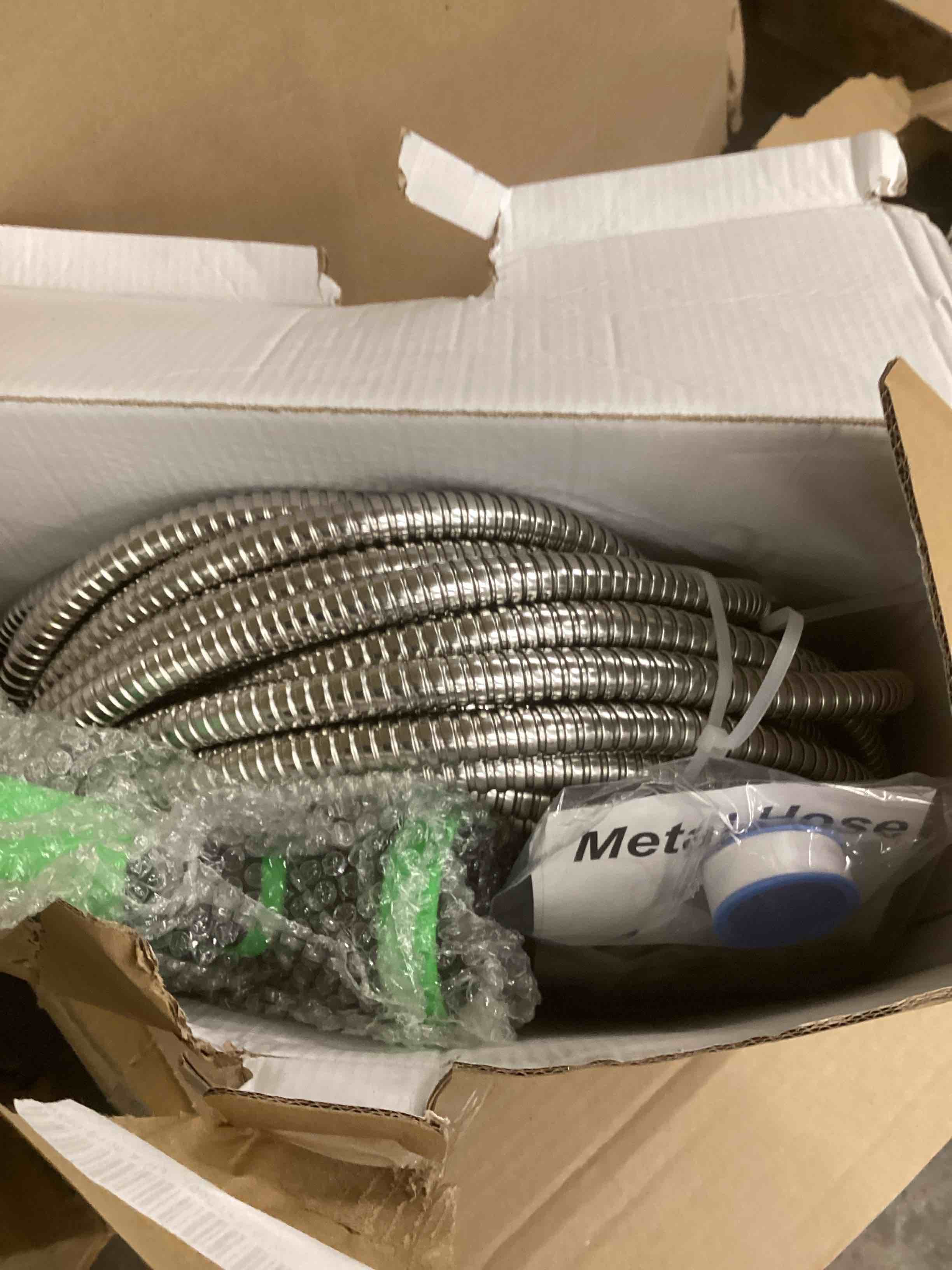 Condition photo showing New/Like New for stainless steel garden hose,100ft