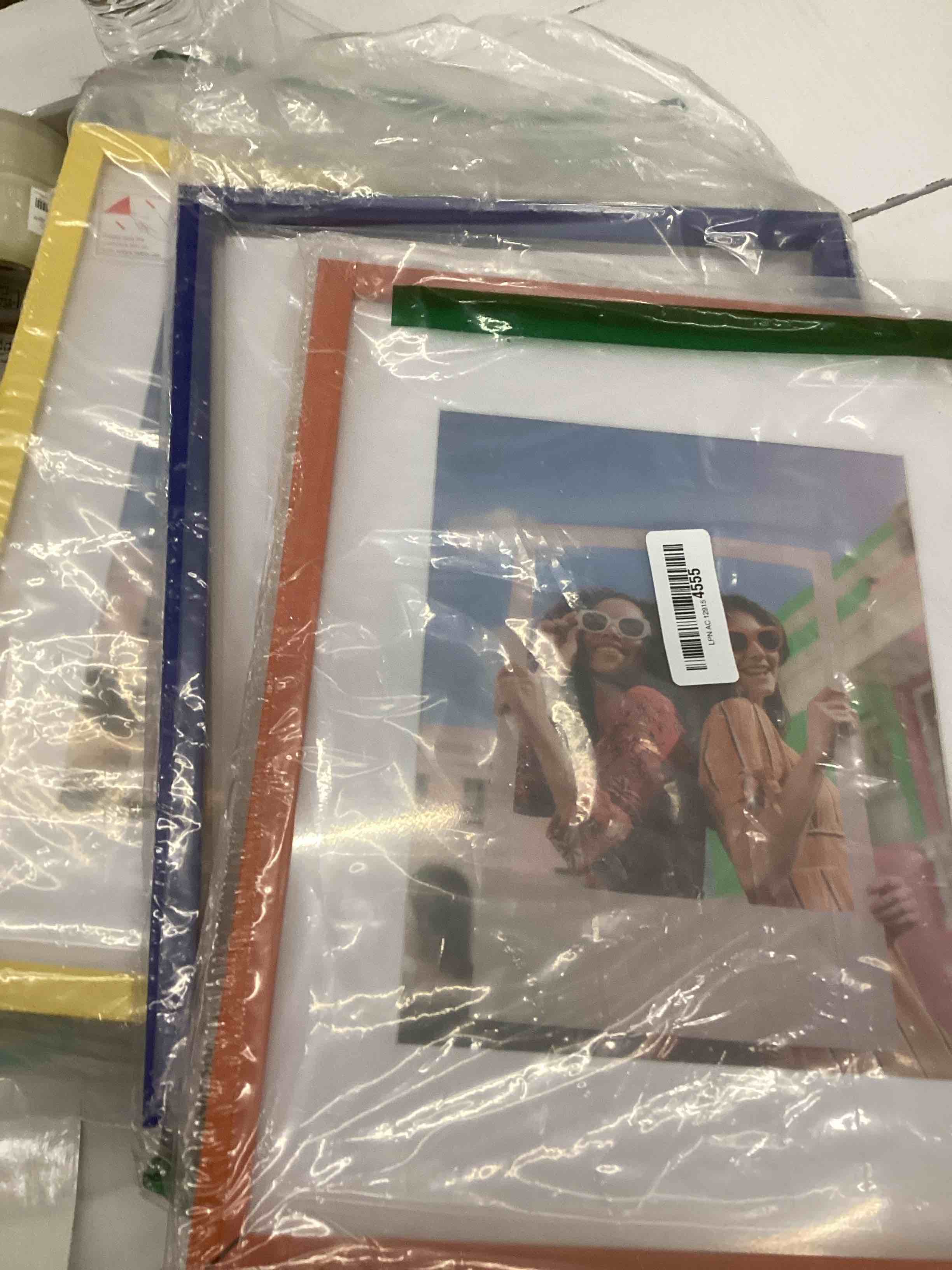 Condition photo showing As Is for picture frame 3-pack (blue,yellow and pink)
