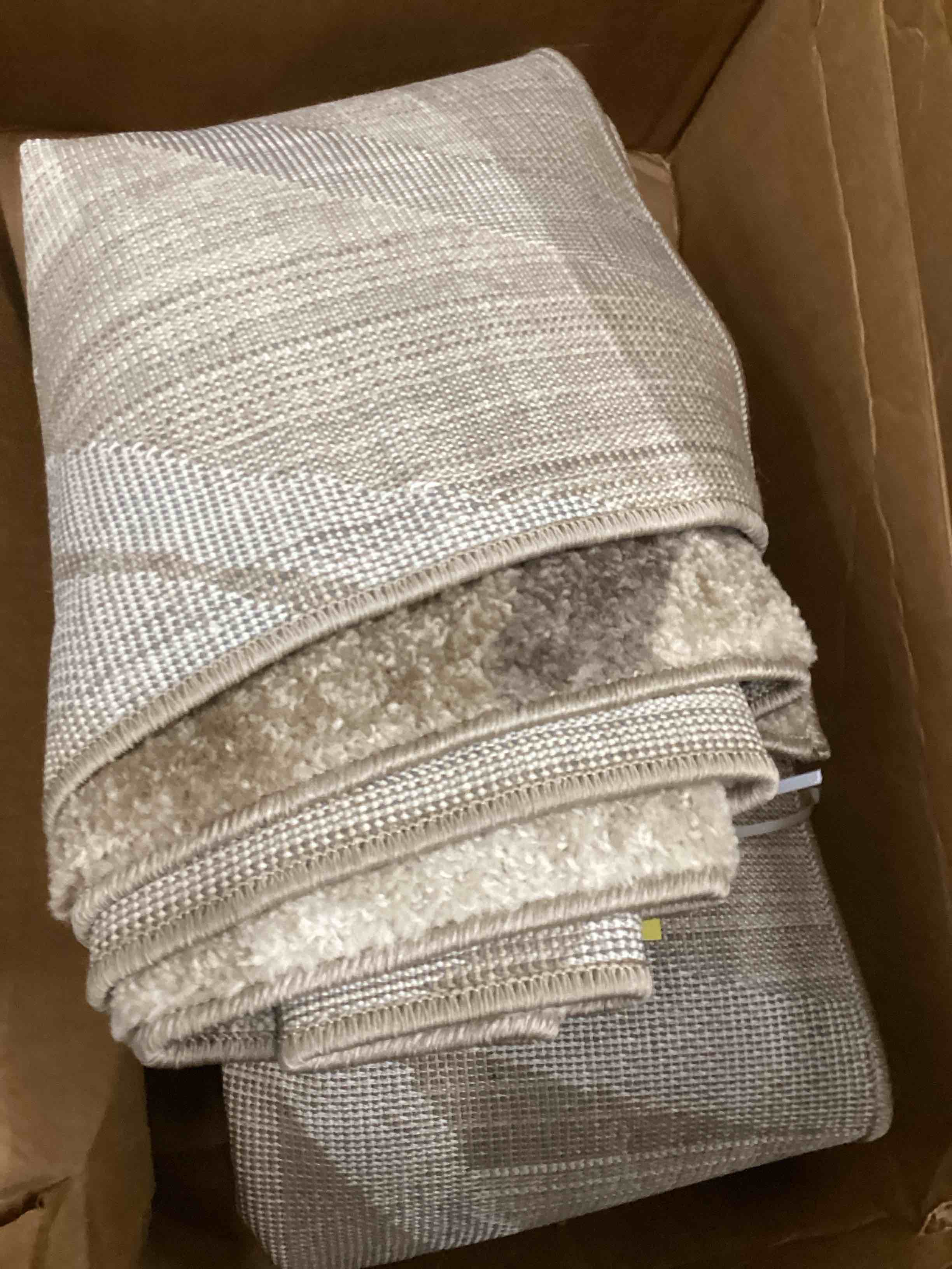 Condition photo showing As Is for Foerster Abstract Indoor Rug See More by Orren Ellis  Brown 5’3”X7’3”