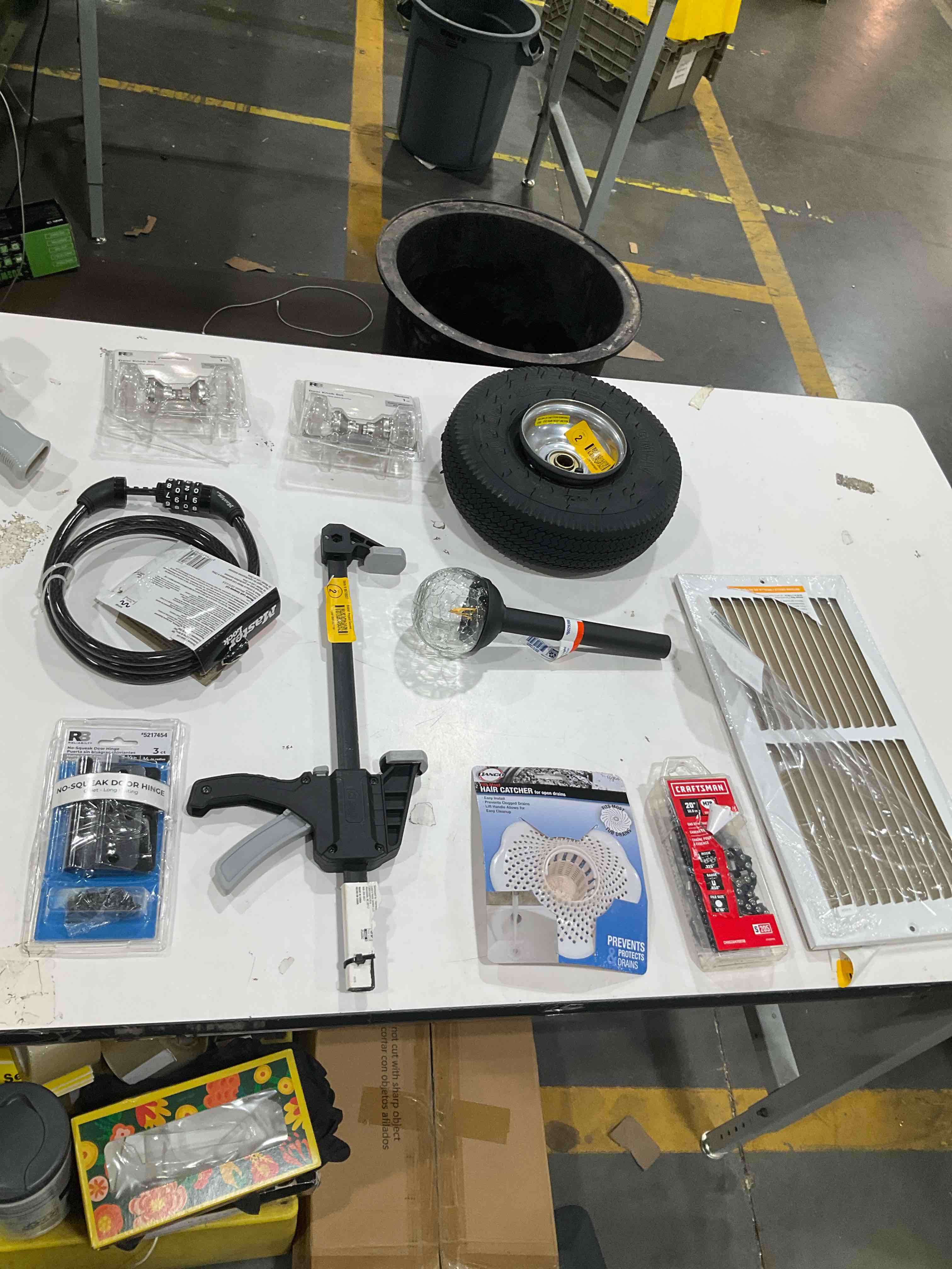 Condition photo showing As Is for assorted home improvement lot (small tools, screw, home accessories, etc.)