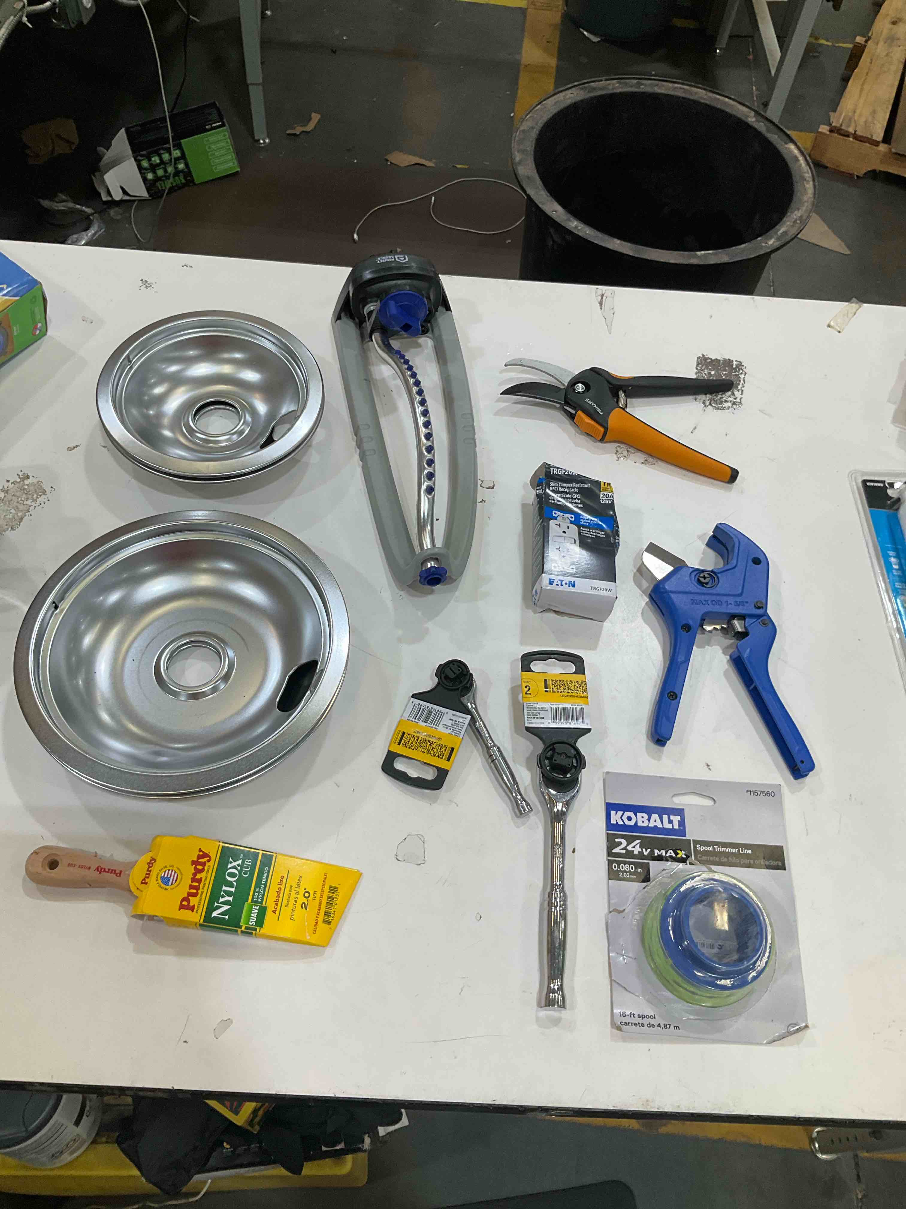 Condition photo showing As Is for assorted home improvement lot (small tools, screw, home accessories, etc.)