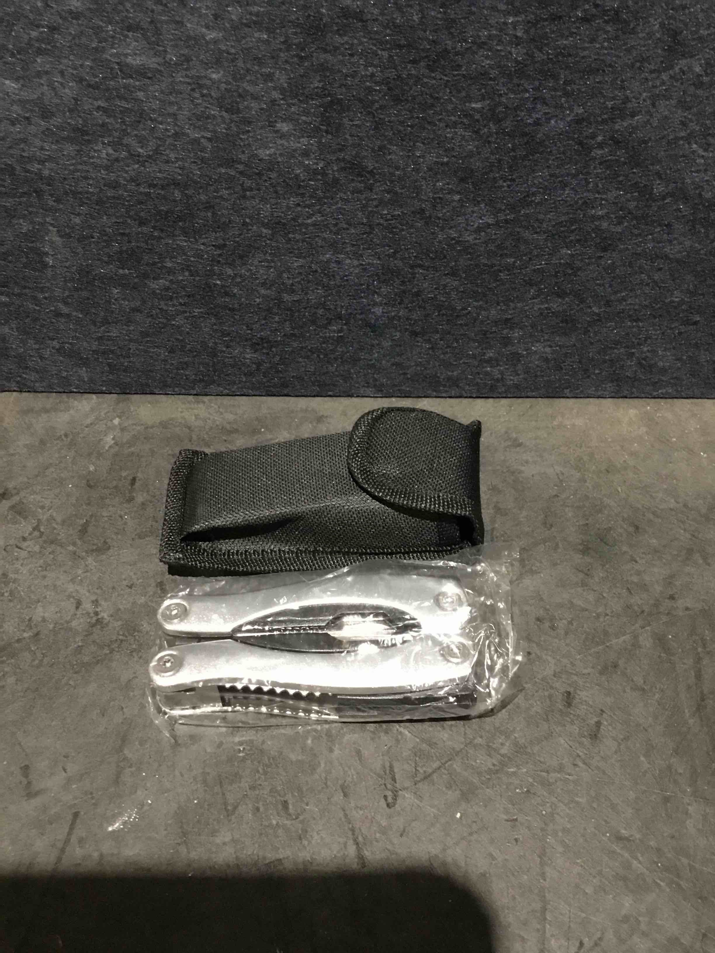 Condition photo showing New/Like New for fix grip multitool, silver