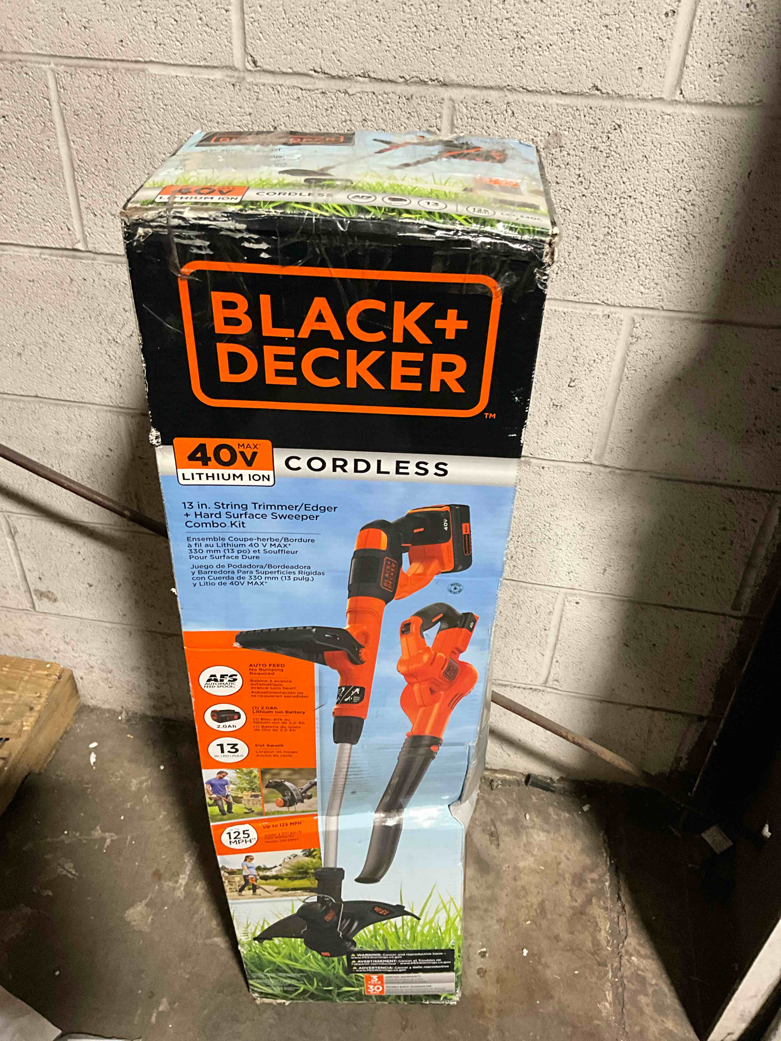 Condition photo showing New/Like New for BLACK+DECKER LCC340C 40V MAX* Lithium-Ion Cordless String Trimmer & Sweeper Combo Kit