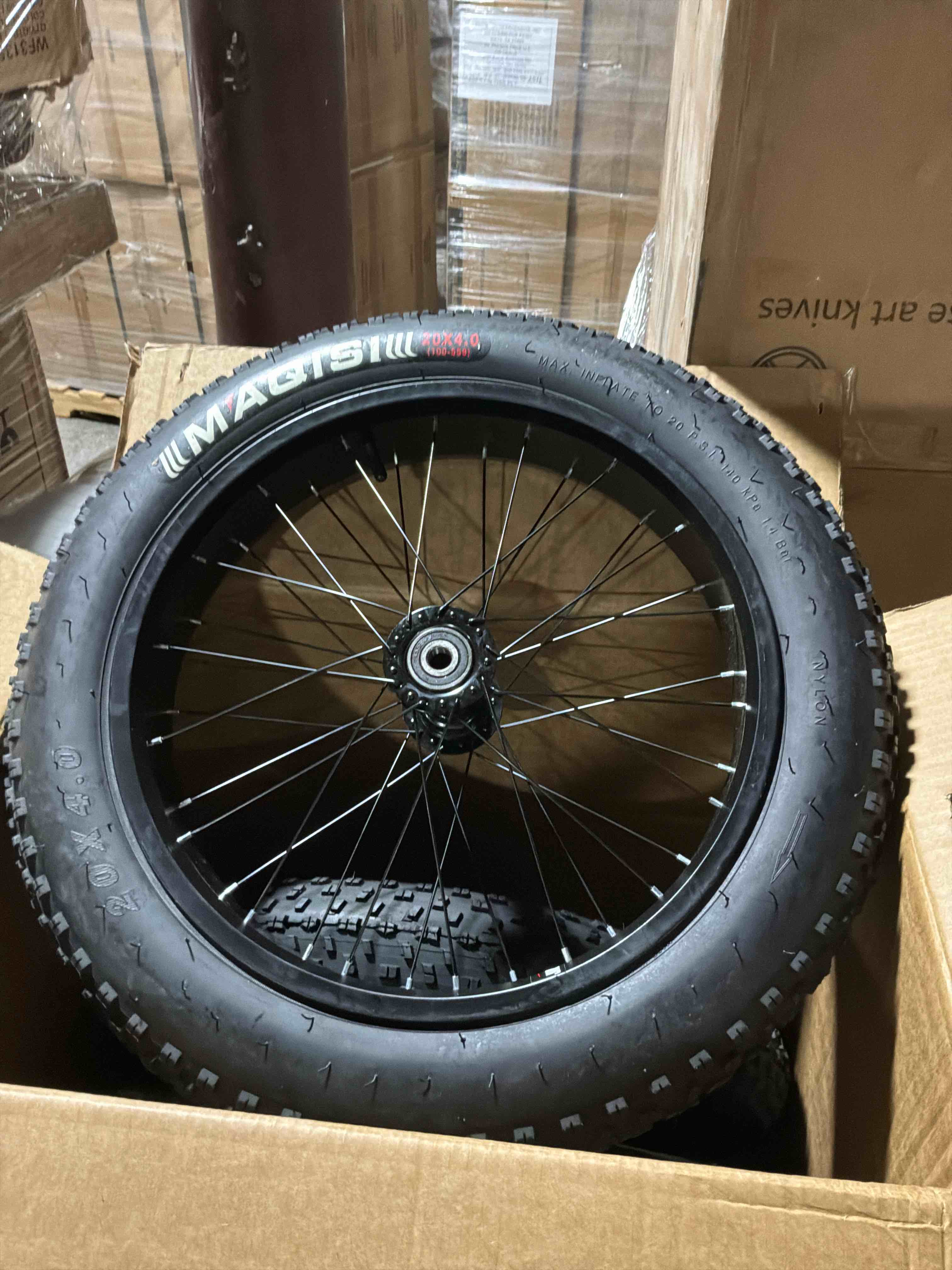 Condition photo showing New/Like New for box of 3 20x4.0 fat tire wheel