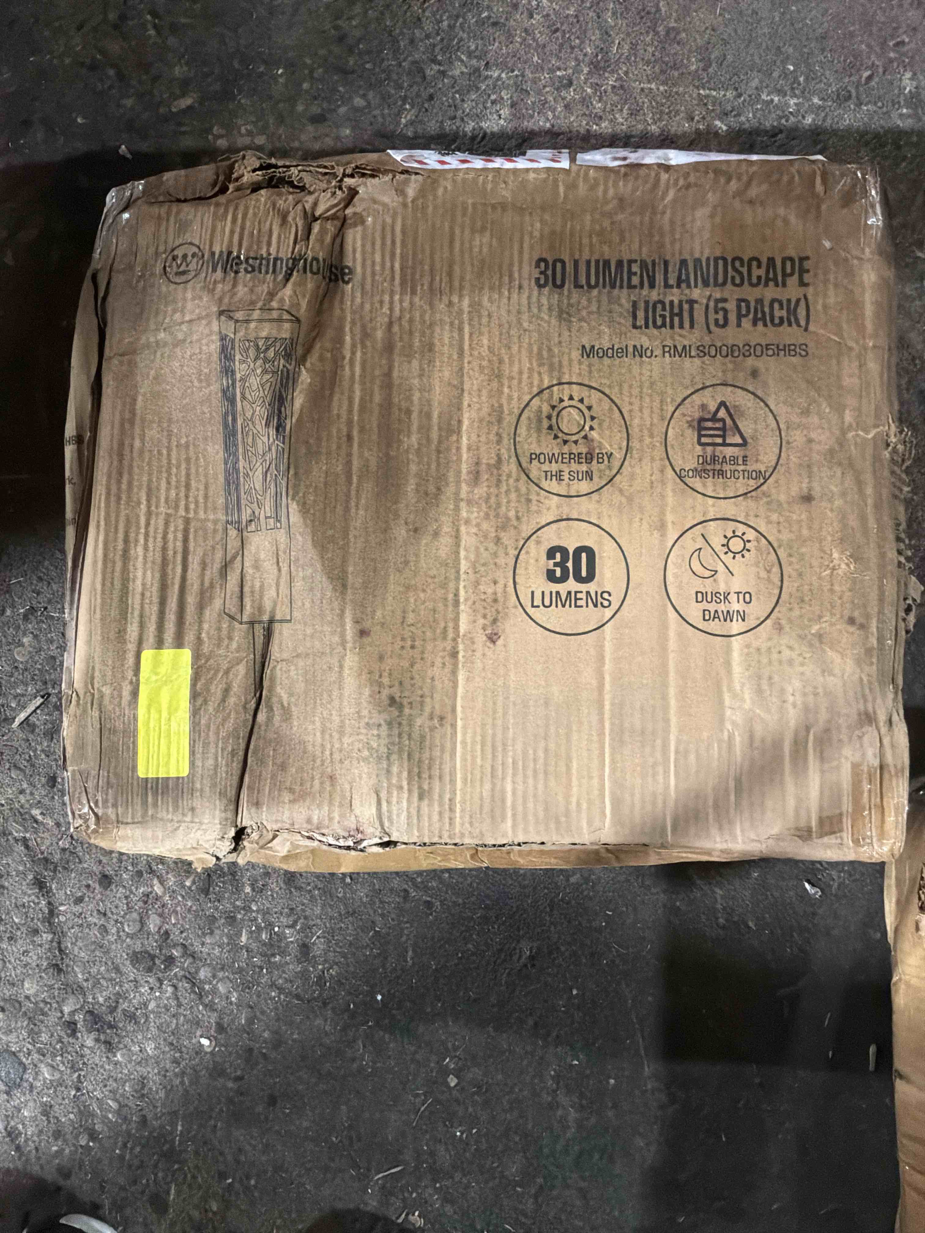 Condition photo showing As Is for westinghouse 5-pack 30-lumens black solar led rgb outdoor path light kit (3000-k)