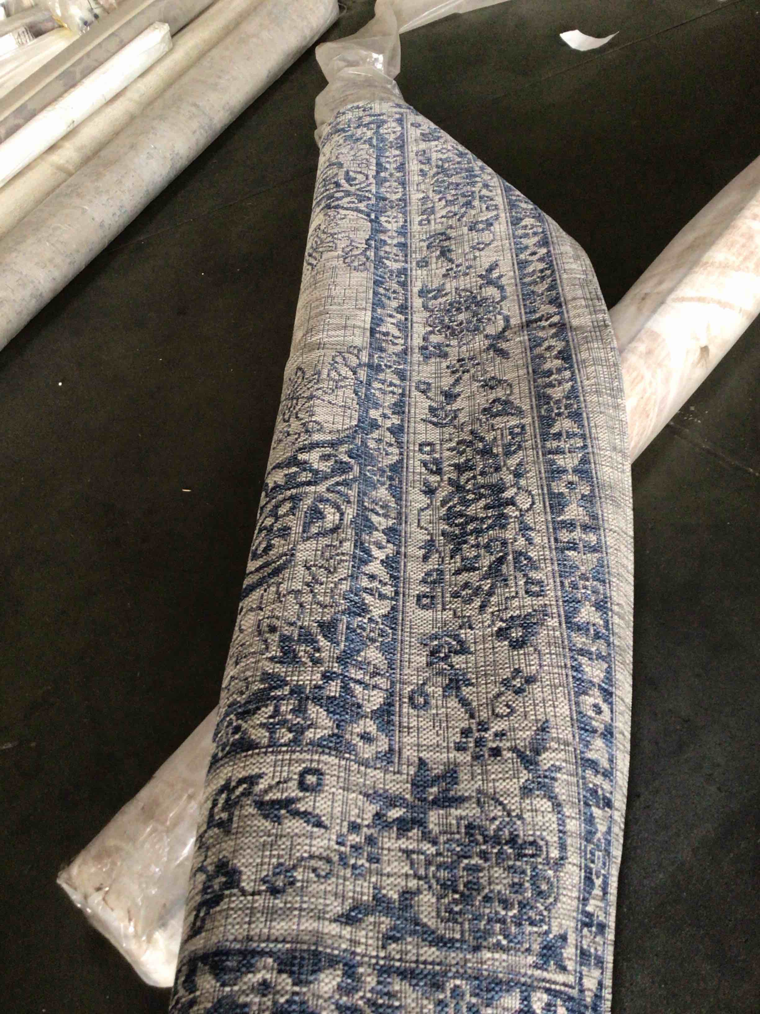 Condition photo showing New/Like New for spitler power loom gray/ivory indoor/outdoor 7ft 8in x 9ft 8in