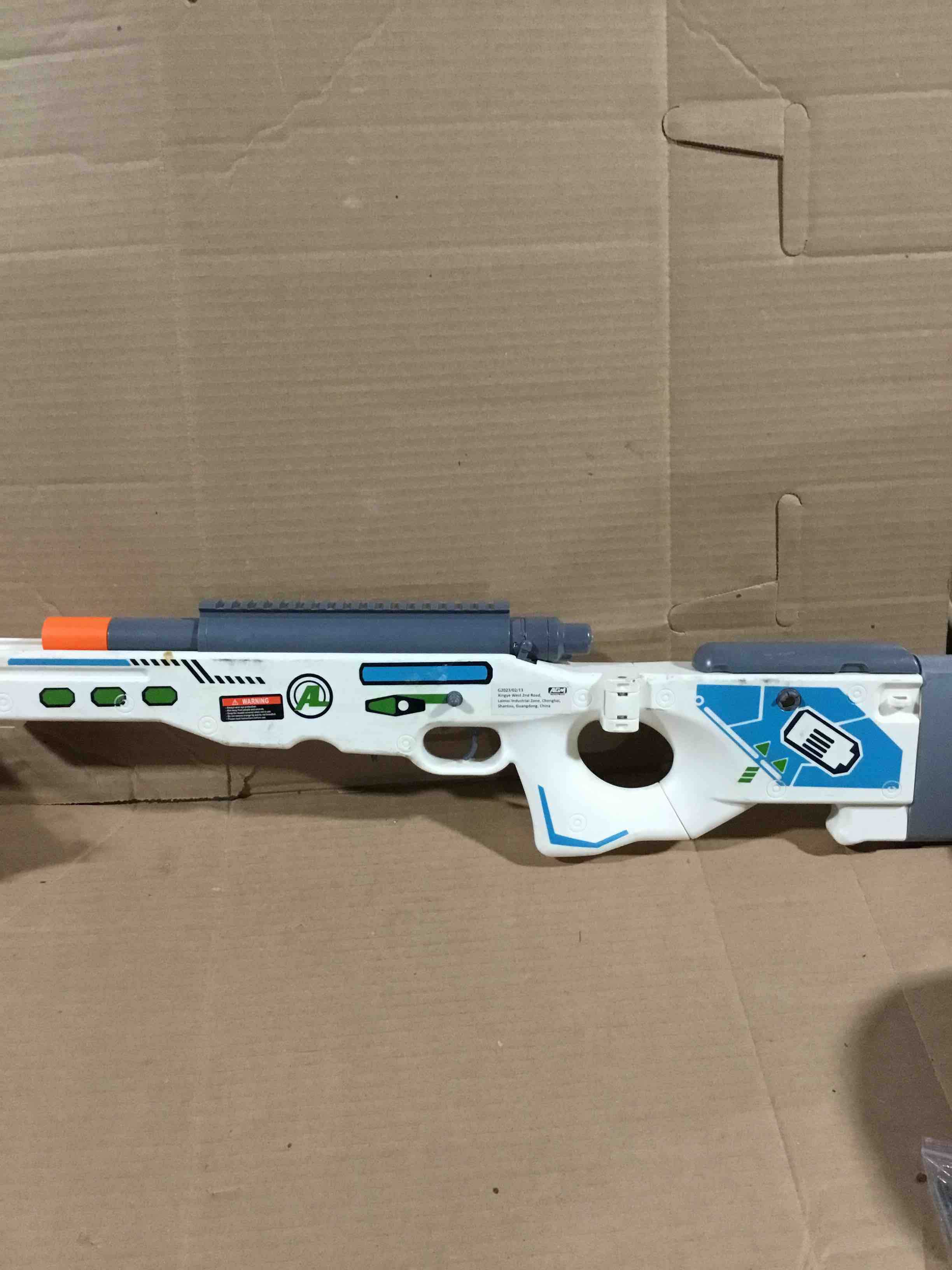 Condition photo showing Good Condition for AGM MASTECH AWM Soft Bullet Toy Gun, Empty Shell Ejecting Design, Enhanced Scope, Dart Loader, 40 Soft Foam Darts, 20 Shells, 2 Magazines. Blasting Toy Foam Blaster for Boys and Girls (White) PS-014-D