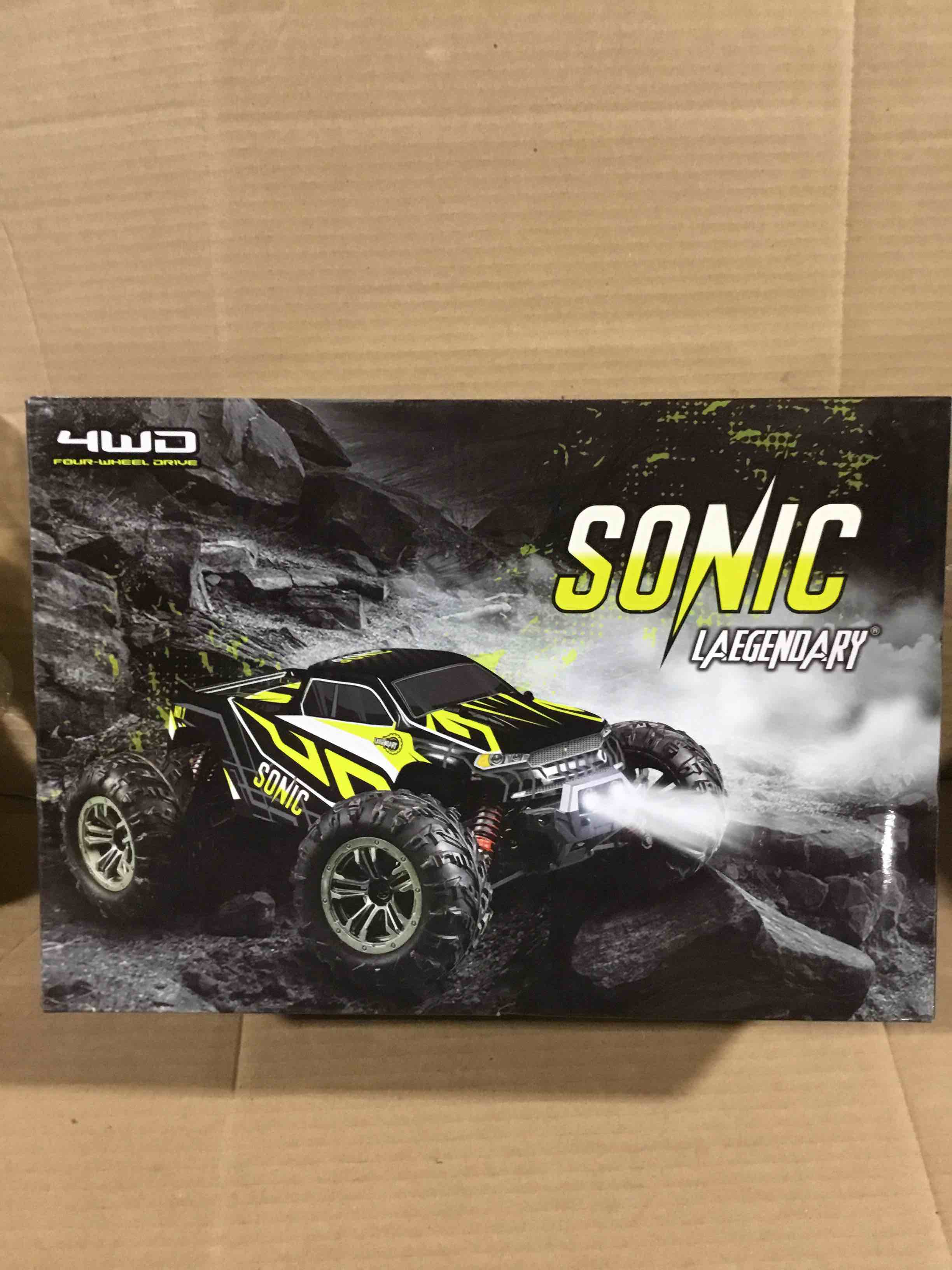Condition photo showing New/Like New for LAEGENDARY Fast RC Cars for Adults and Kids - 4x4, Off-Road Remote Control Car - Battery-Powered, Hobby Grade, Waterproof Monster RC Truck - Toys and Gifts for Boys, Girls and Teens Black - Yellow