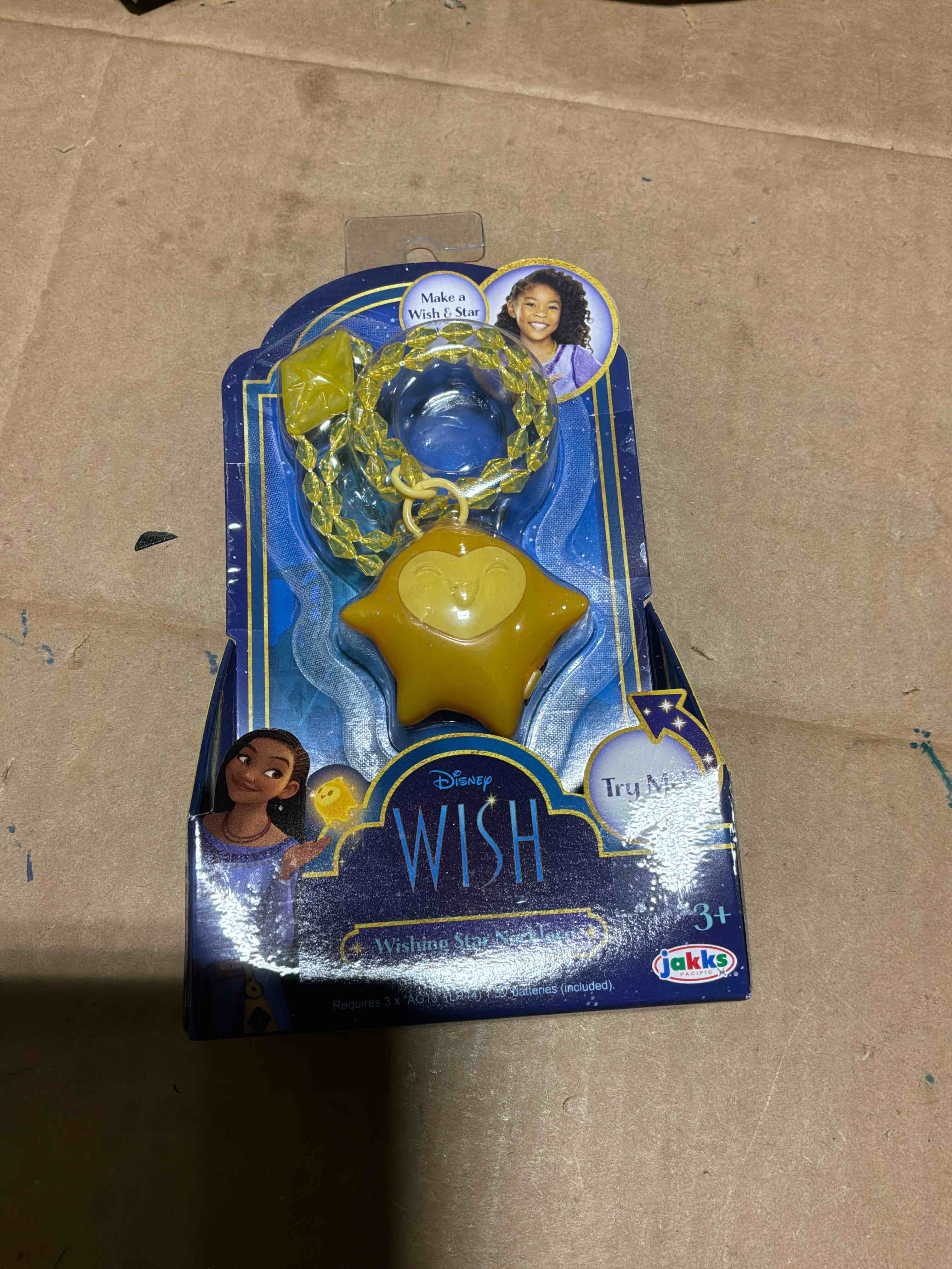 Condition photo showing New/Like New for Disney's Wish Wishing Star Necklace with Light Up Feature