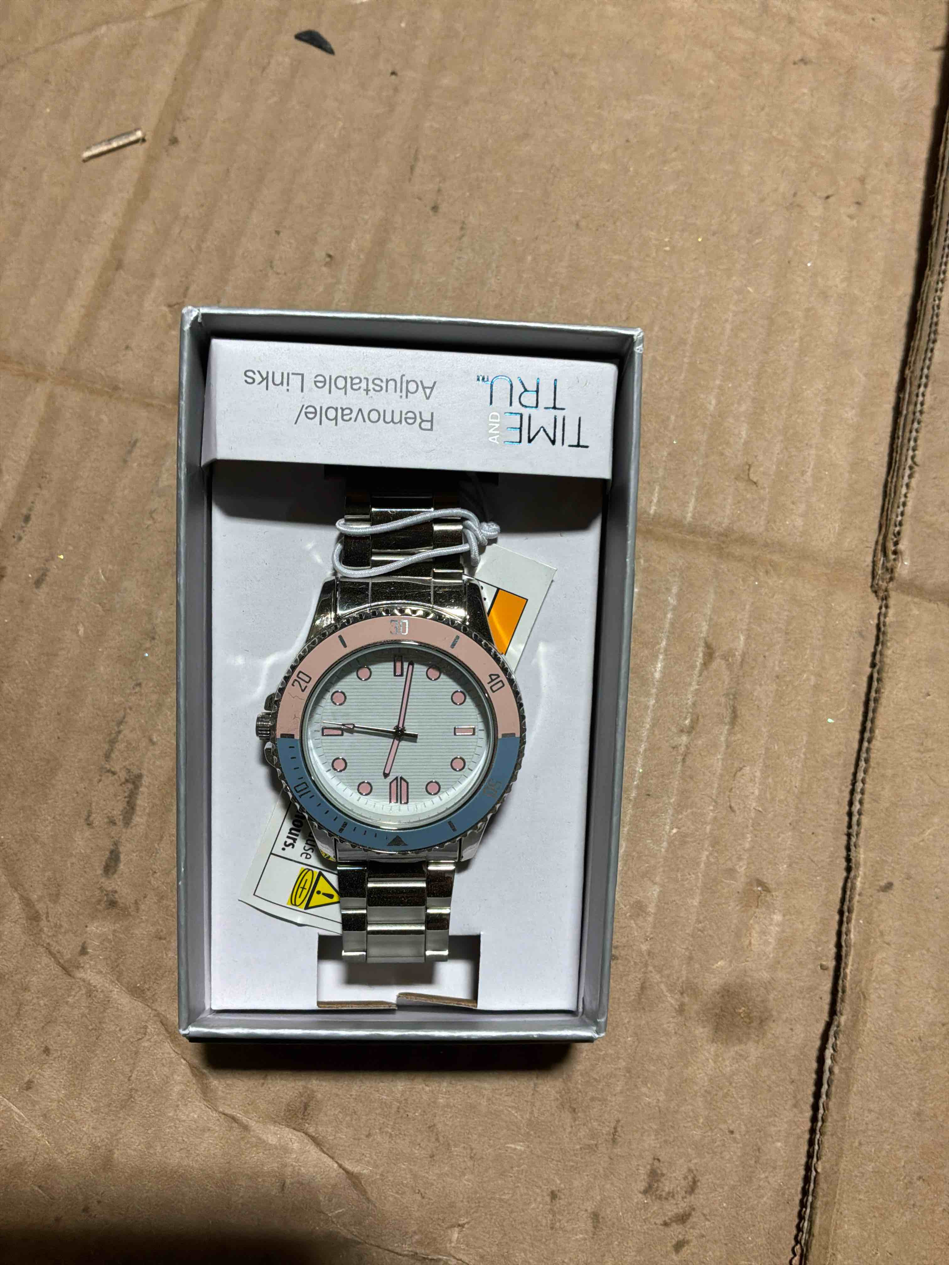 Condition photo showing New/Like New for Time and Tru Silver Tone Bracelet White Round Pink and Blue Bezel Casual Ladies Watch