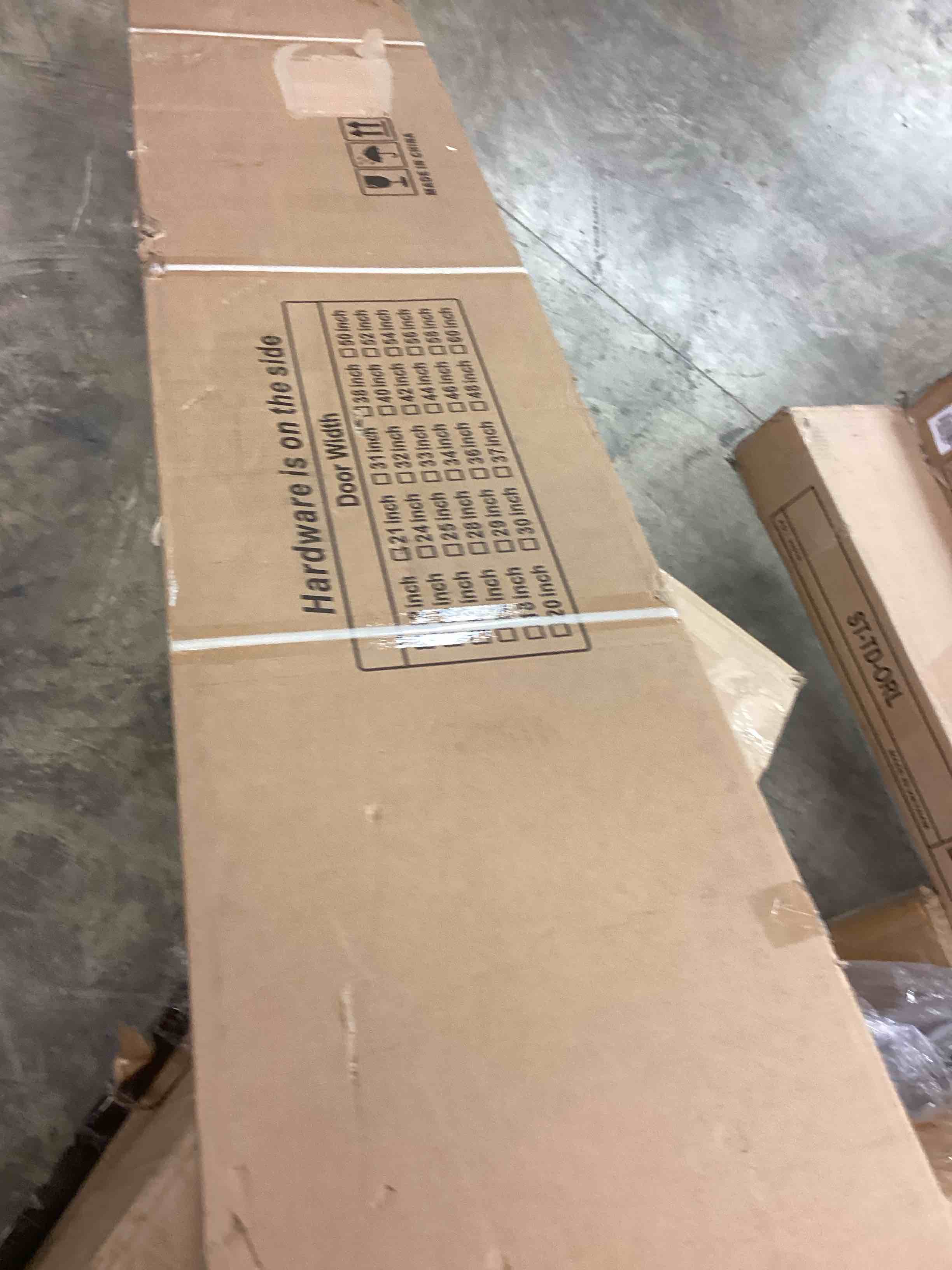 Condition photo showing New/Like New for paintable 2-panel double bi-fold door, white primed manufactured 