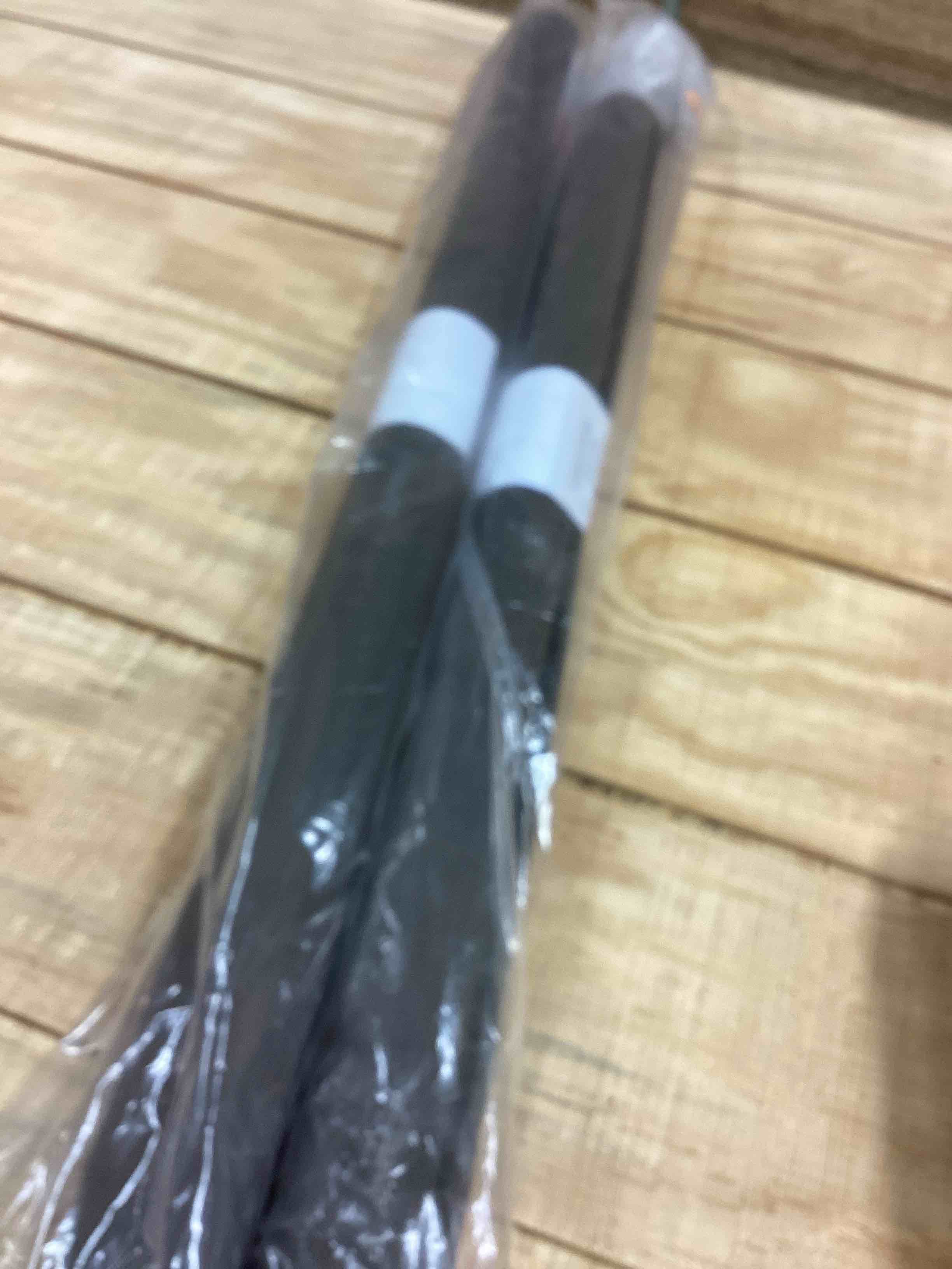 Condition photo showing New/Like New for sheer dark bronze roller shade 46 x 84