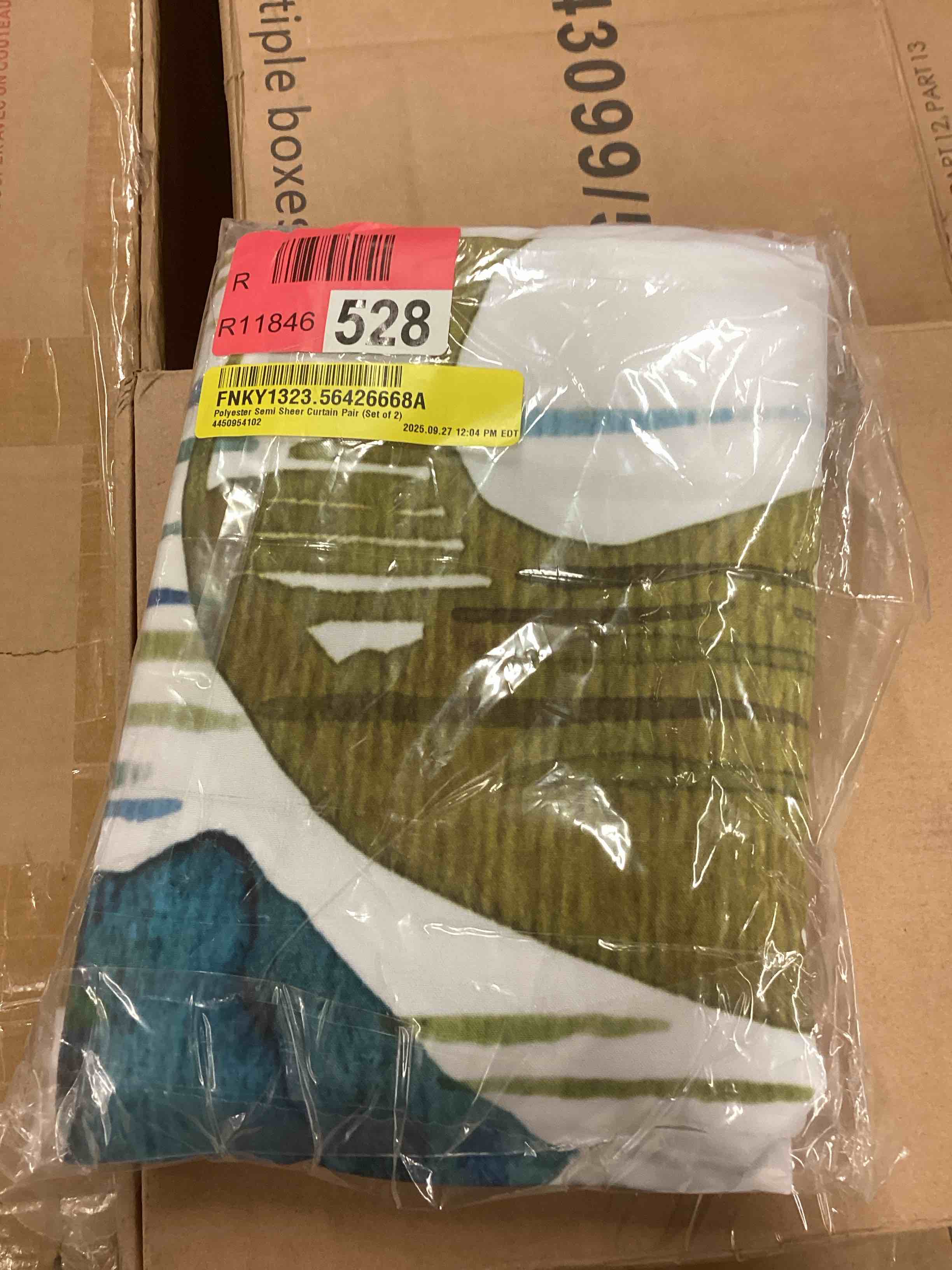 Condition photo showing New/Like New for polyester semi sheer curtain pair (set of 2) 