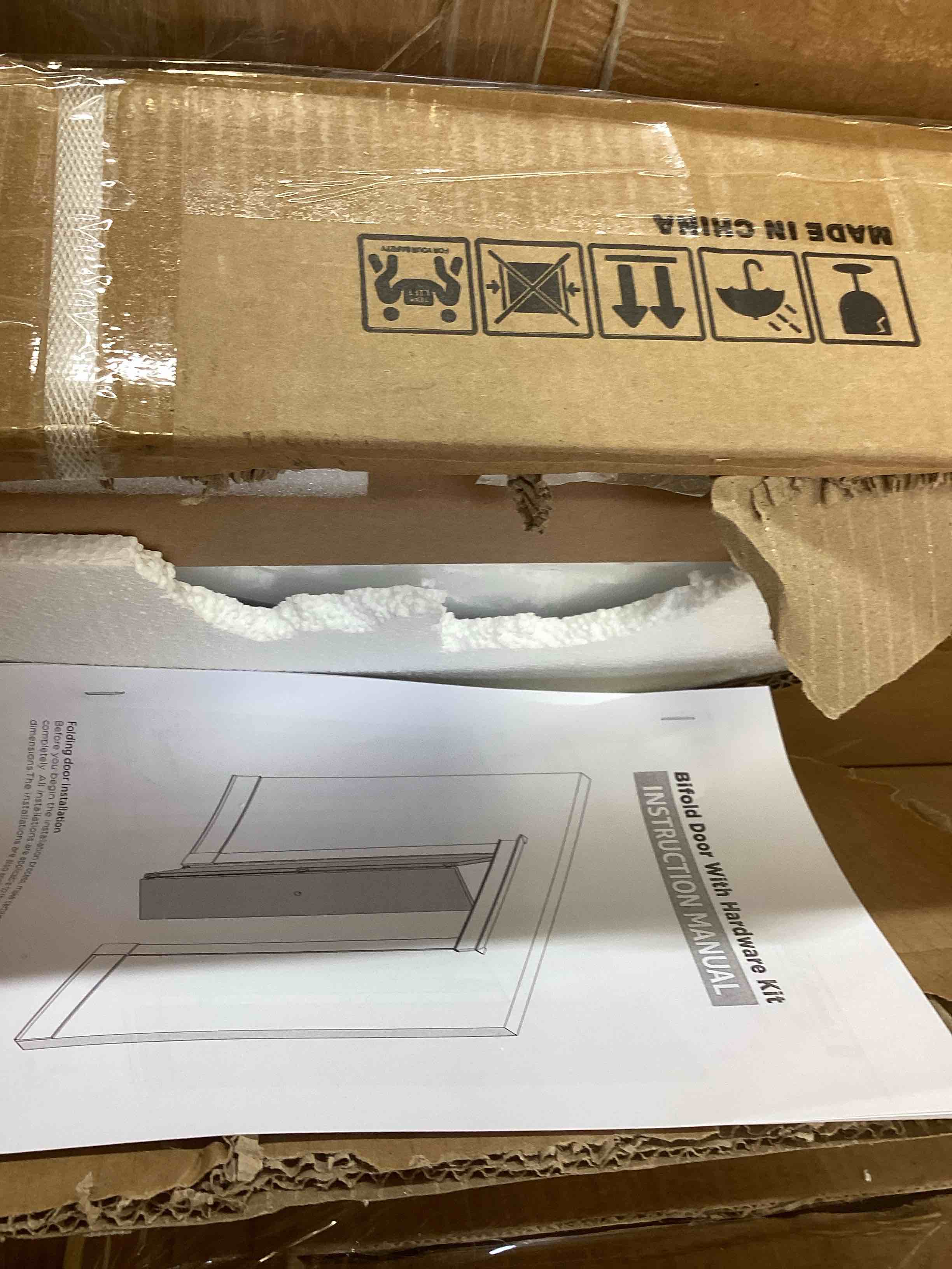 Condition photo showing New/Like New for 2-panel shaker style pine bifold door (similar) 