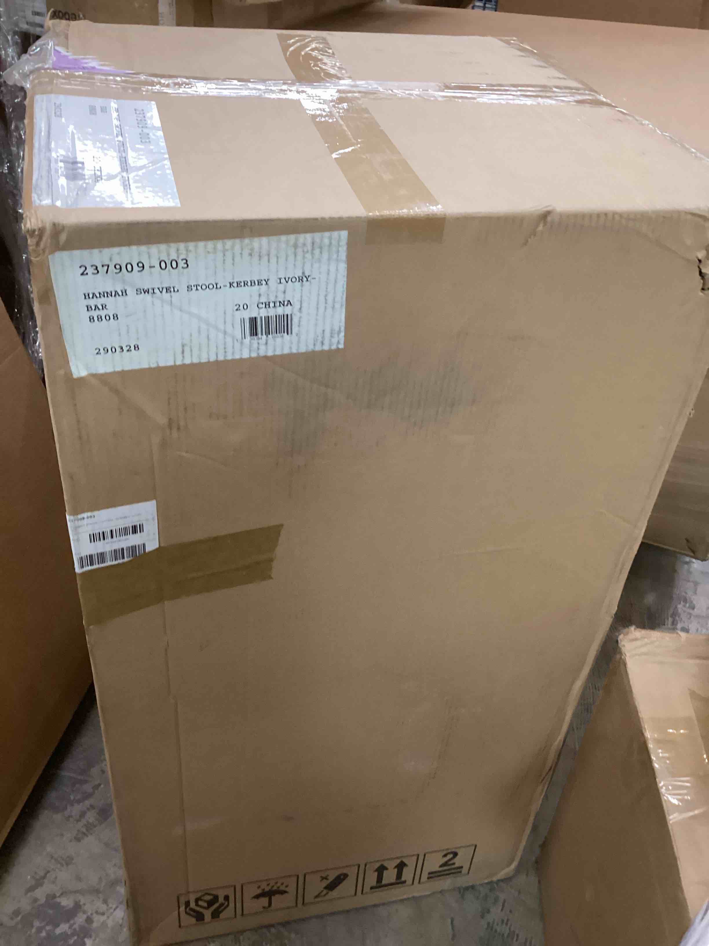Condition photo showing New/Like New for bahari upholstered swivel stool 