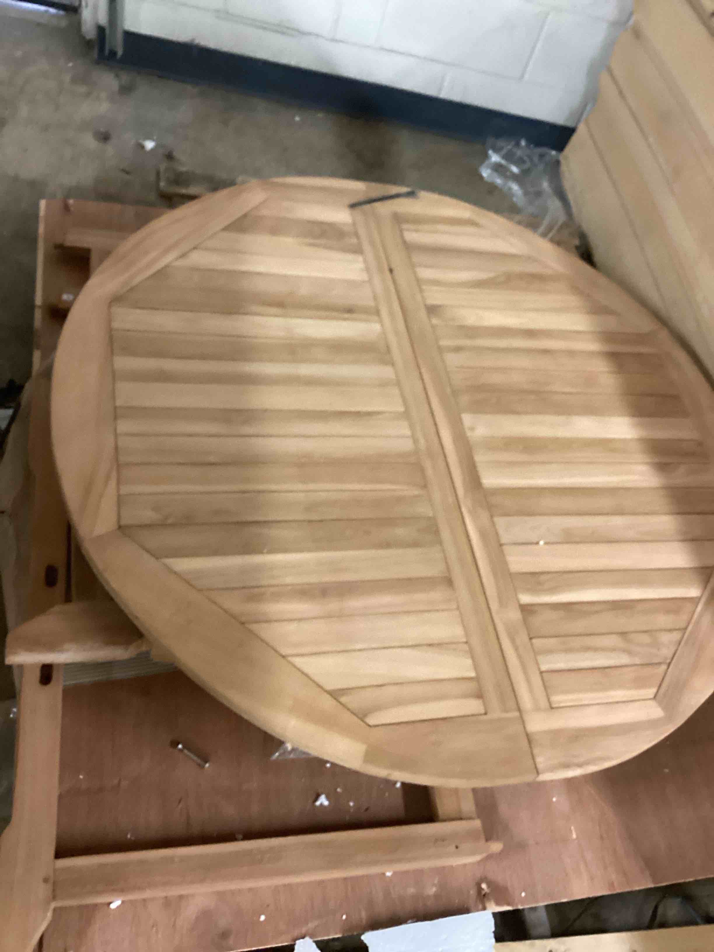 Condition photo showing New/Like New for ocean beach round to oval outdoor patio extension table, made from solid teak wood