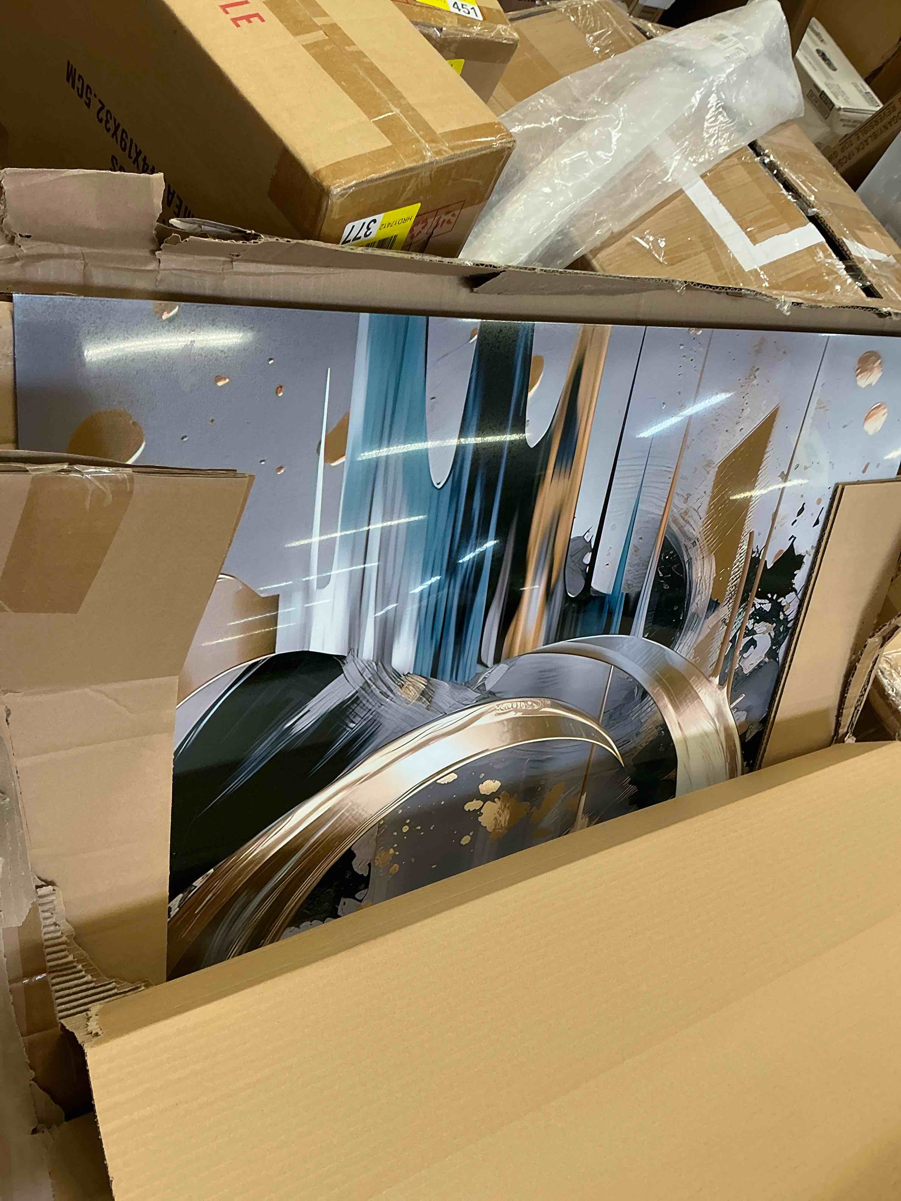 Condition photo showing Good Condition for square metal wall art blend of golden, grey, black, and blue abstract shapes and lines