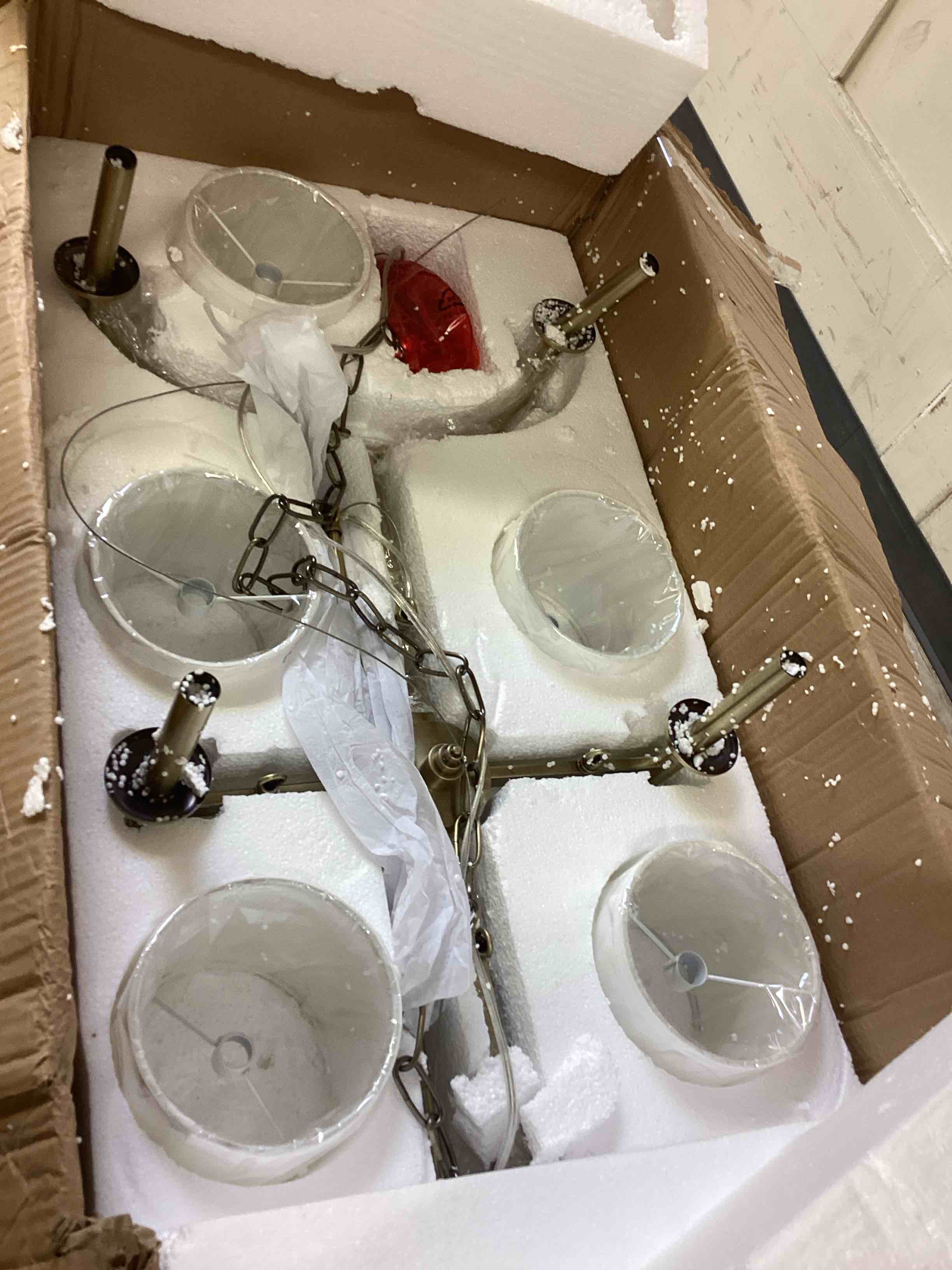 Condition photo showing New/Like New for elegenza 6 light chandelier