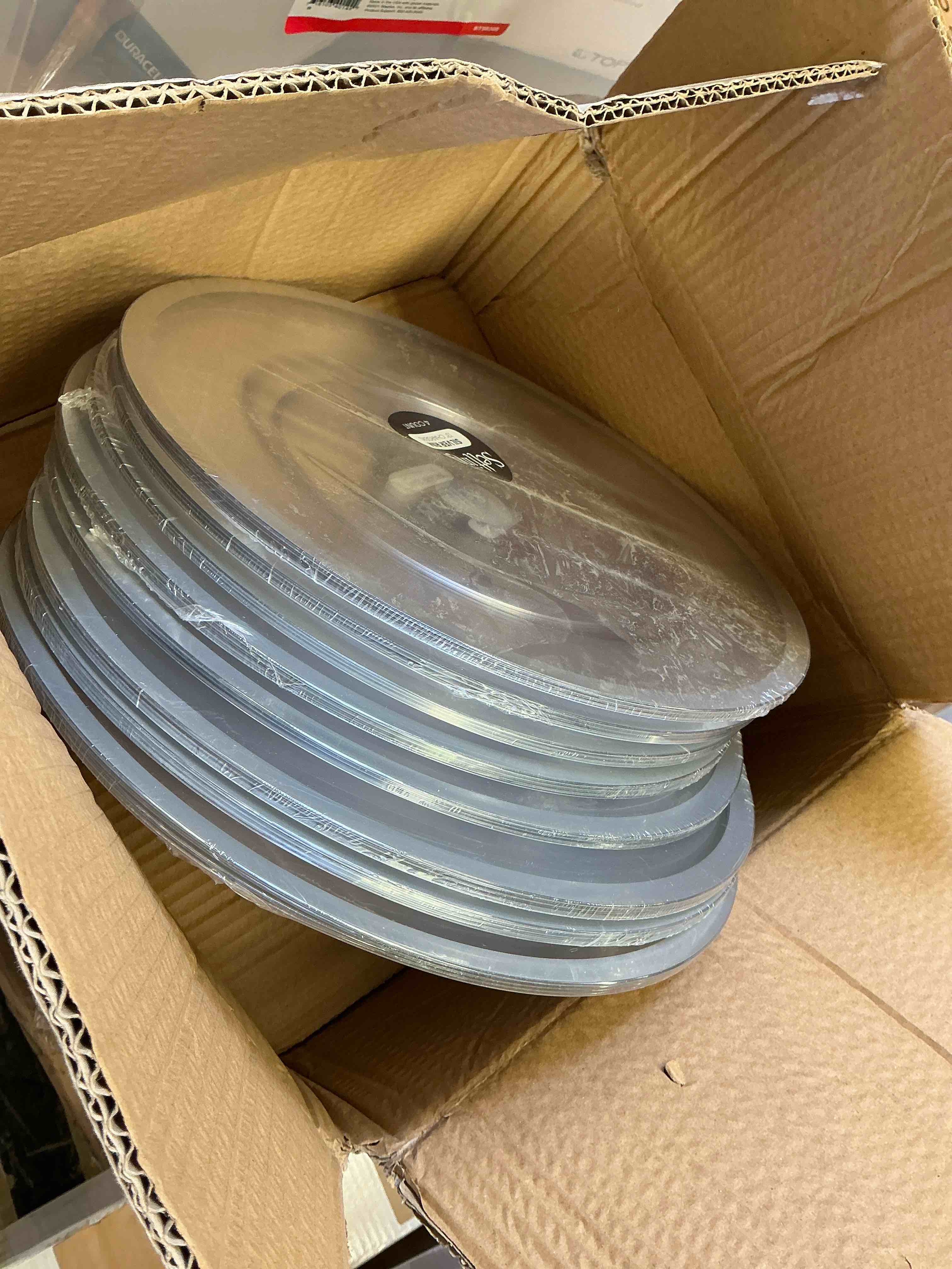 Condition photo showing New/Like New for case of 8 (4ct) clear with silver rim 13” plastic chargers (32pcs)