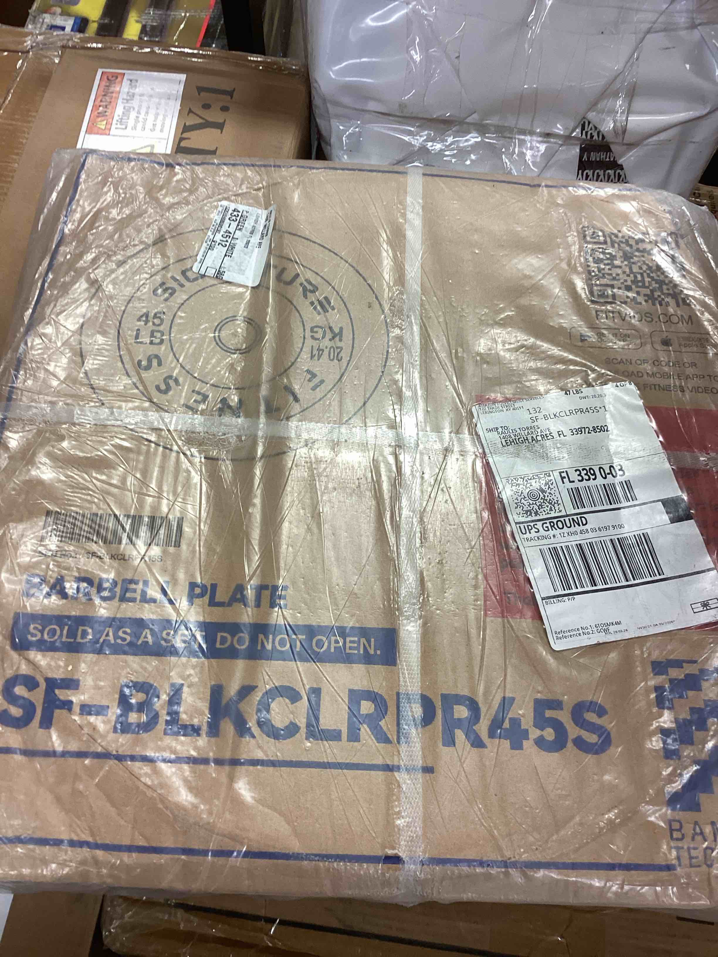 Condition photo showing New/Like New for fitvids signature fitness barbell plate 45lb
