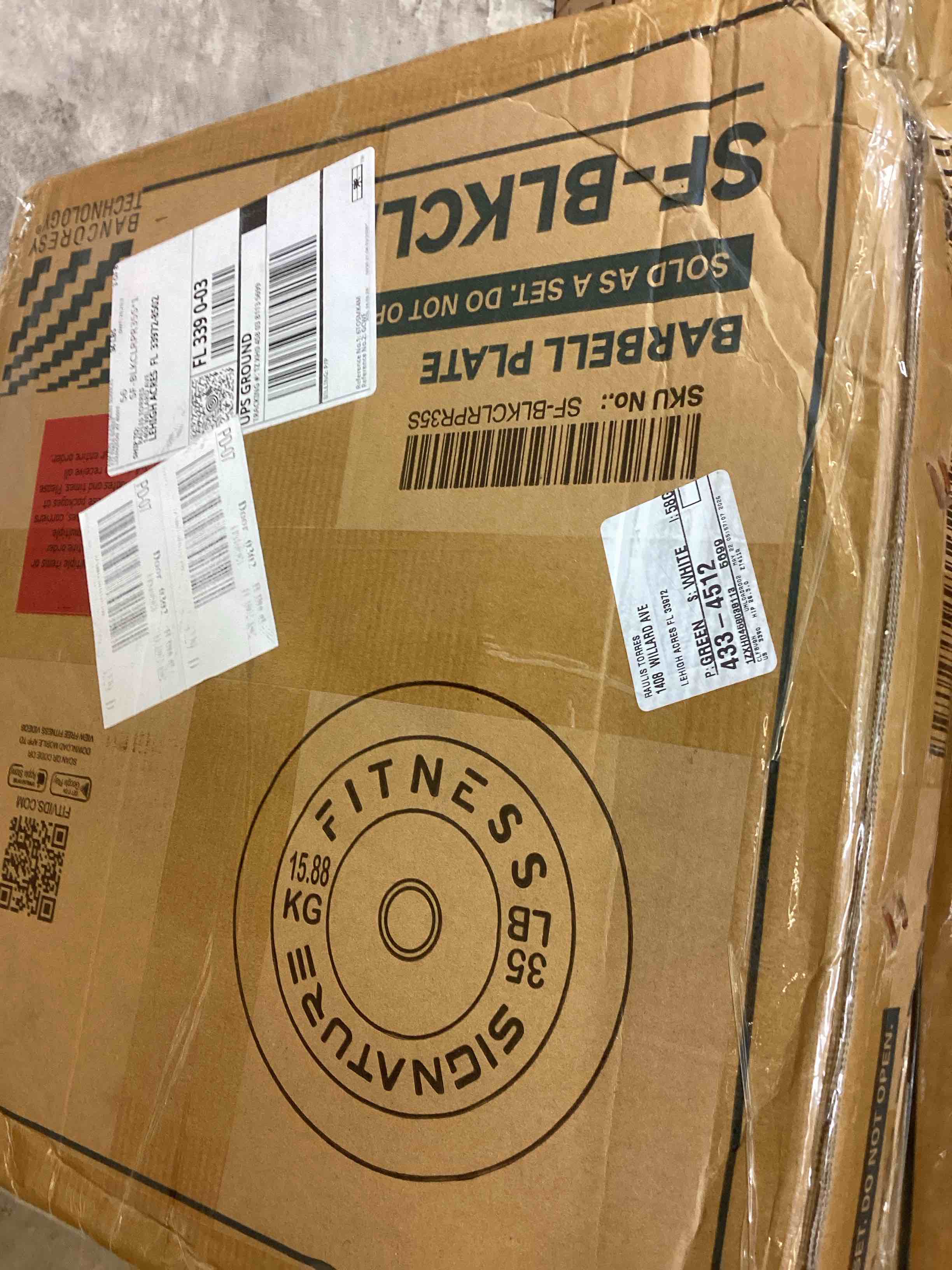 Condition photo showing New/Like New for signature fitness barbell plate 35lb