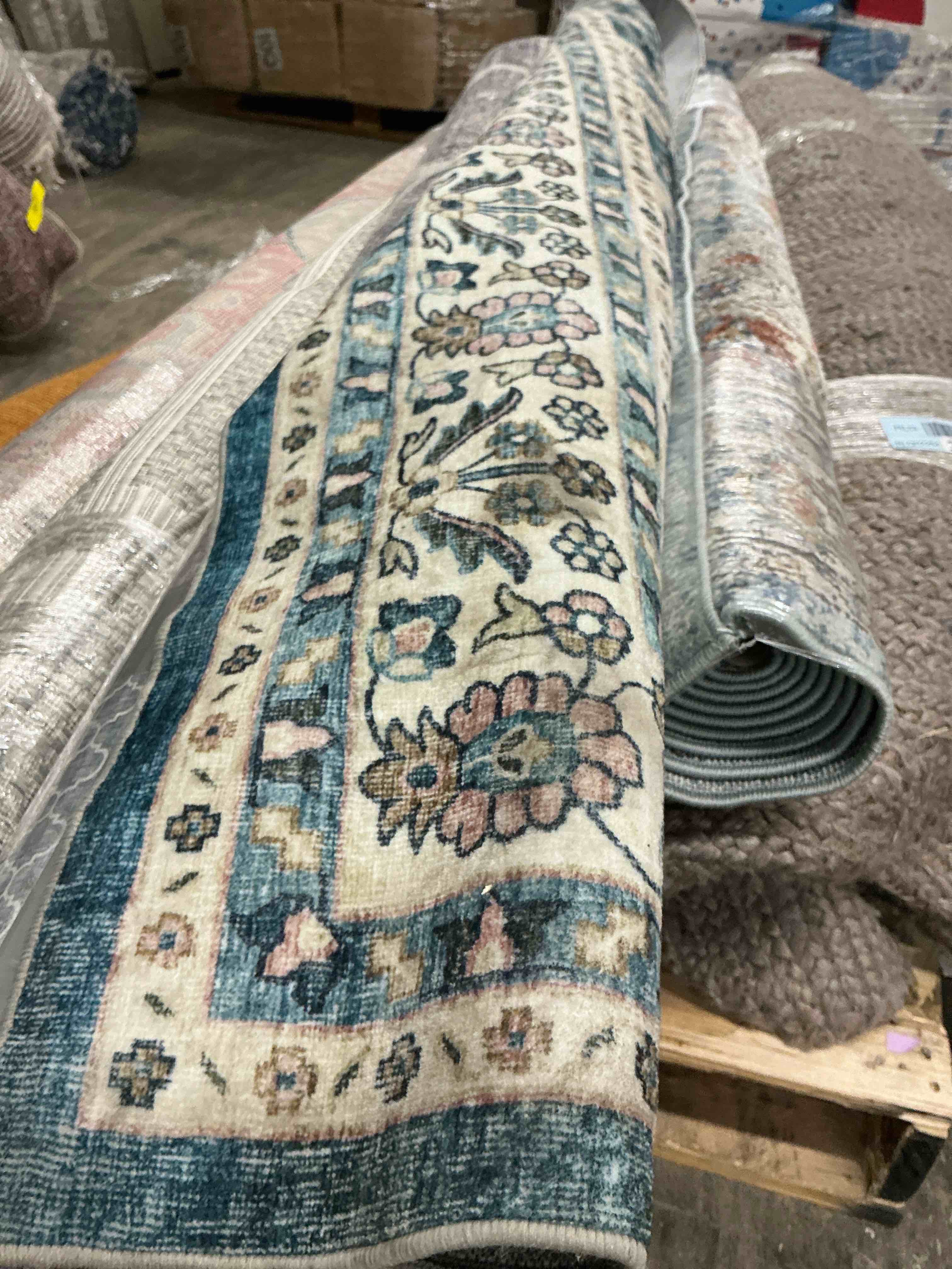 Condition photo showing As Is for oriental weavers sumter washable area rug - sum teal/ivory - vintage inspired, non-slip, stain resitant, ultra low pile, bedroom, office rug