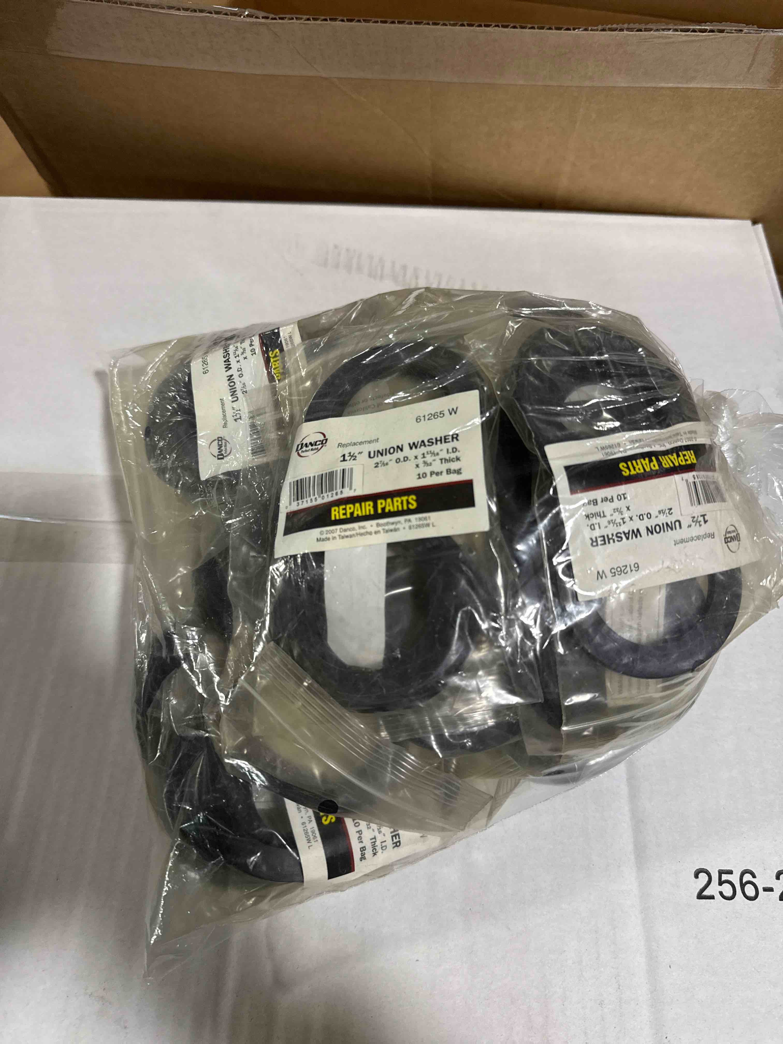 Condition photo showing New/Like New for lot of 26 danco 61265w 1-1/2" union washers, repair parts