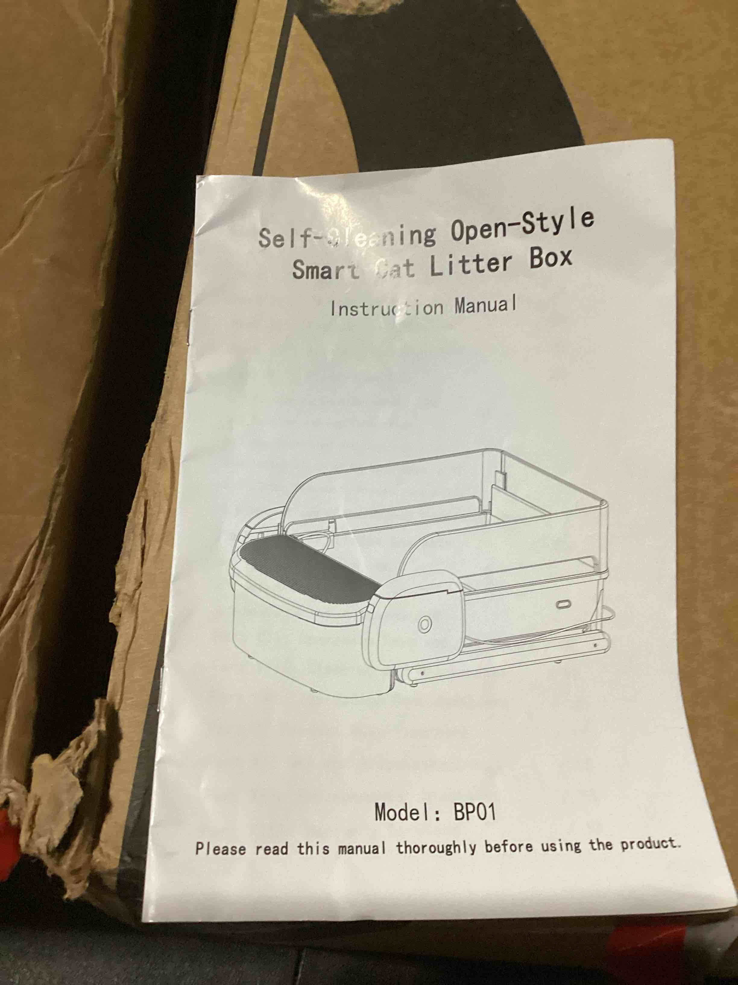 Condition photo showing As Is for self-cleaning litter box, fully open automatic litter box with app control for multiple cats, electric robot with triple sensor protection, 10-liter trash can