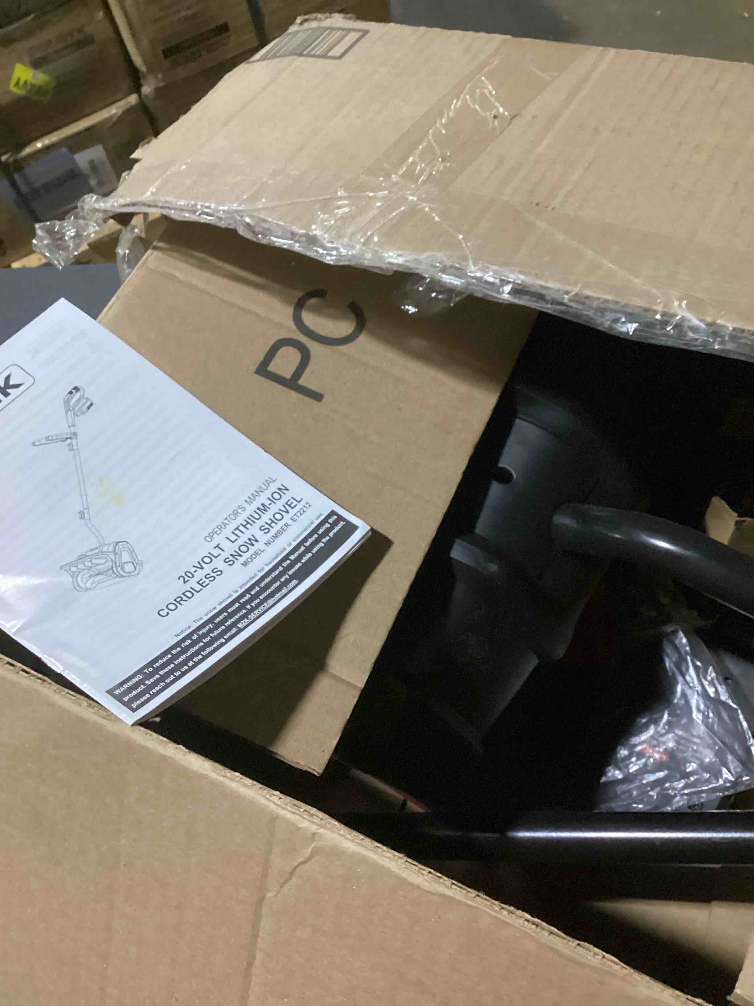 Condition photo showing As Is for magic zaker snow shovel 20 volt. cordless lithium ion. model number et2212