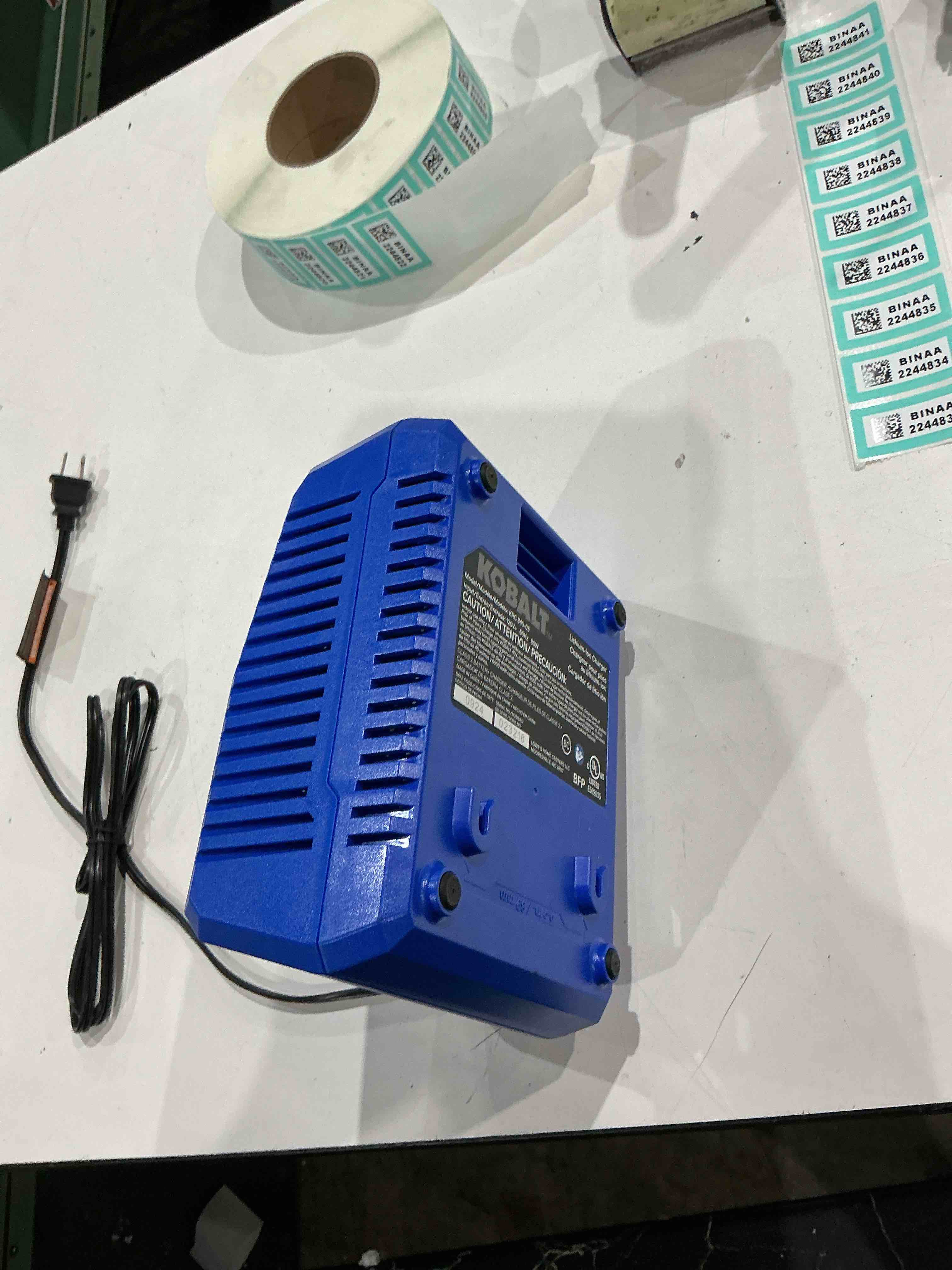 Condition photo showing As Is for kobalt 40 -volt, battery charger