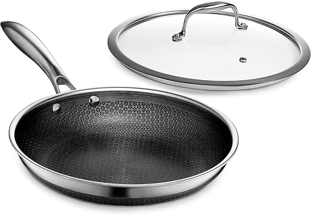 hexclad hybrid nonstick 10-inch frying pan with tempered glass lid, stay-cool handle, dishwasher-fri
