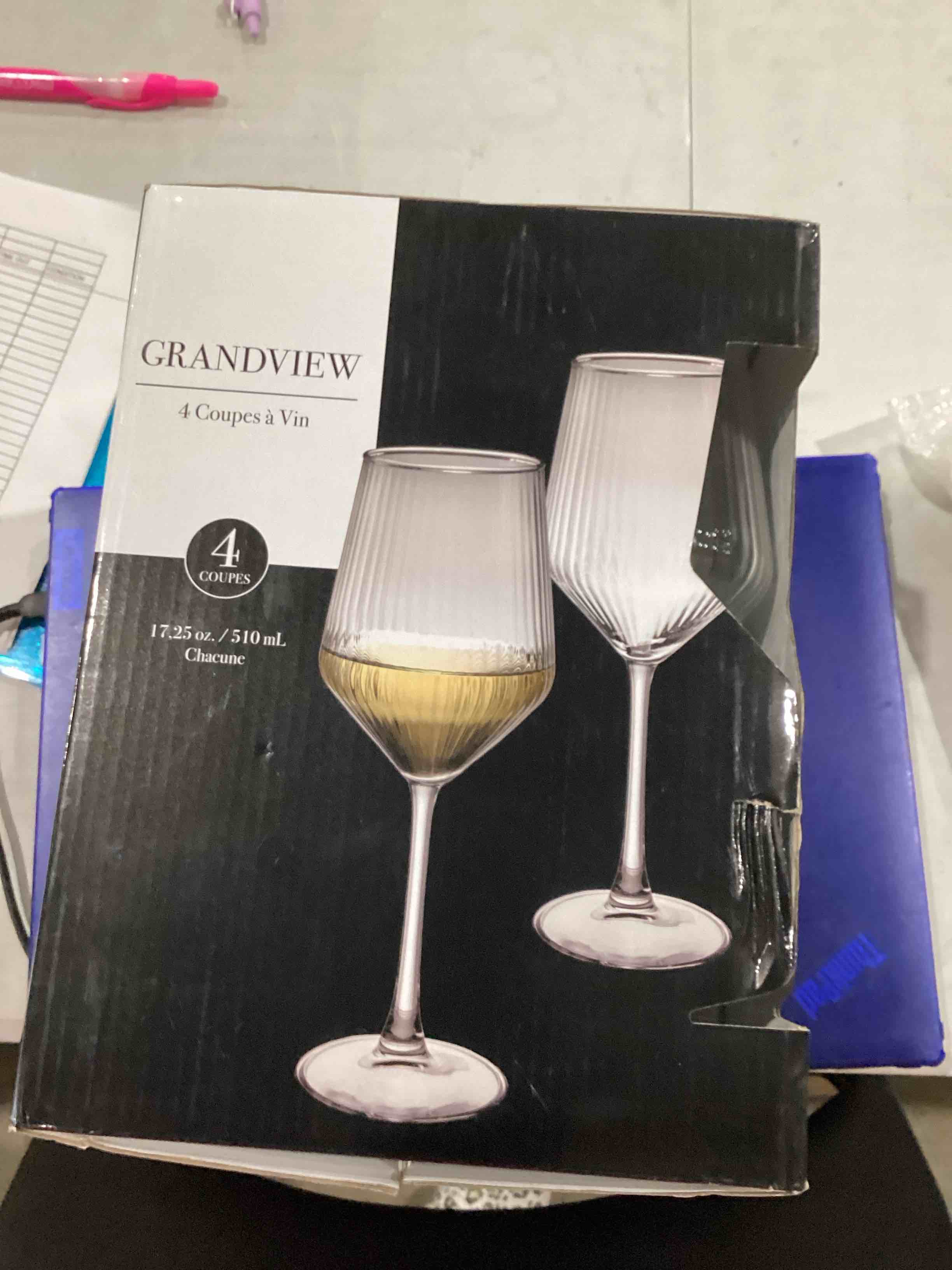 Condition photo showing New/Like New for 4 stemmed wine glasses