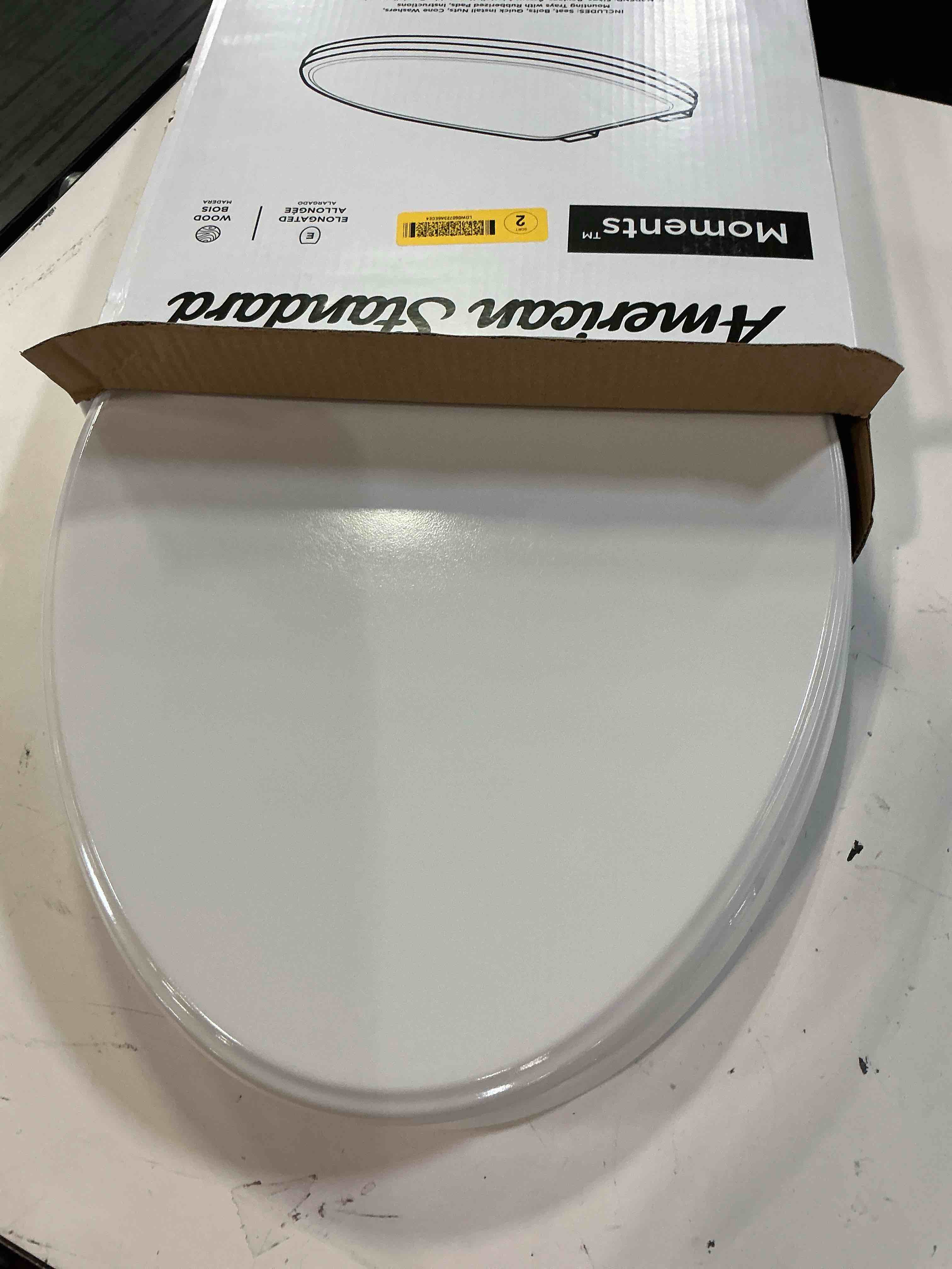 Condition photo showing Good Condition for american standard moments wood white elongated soft close toilet seat
