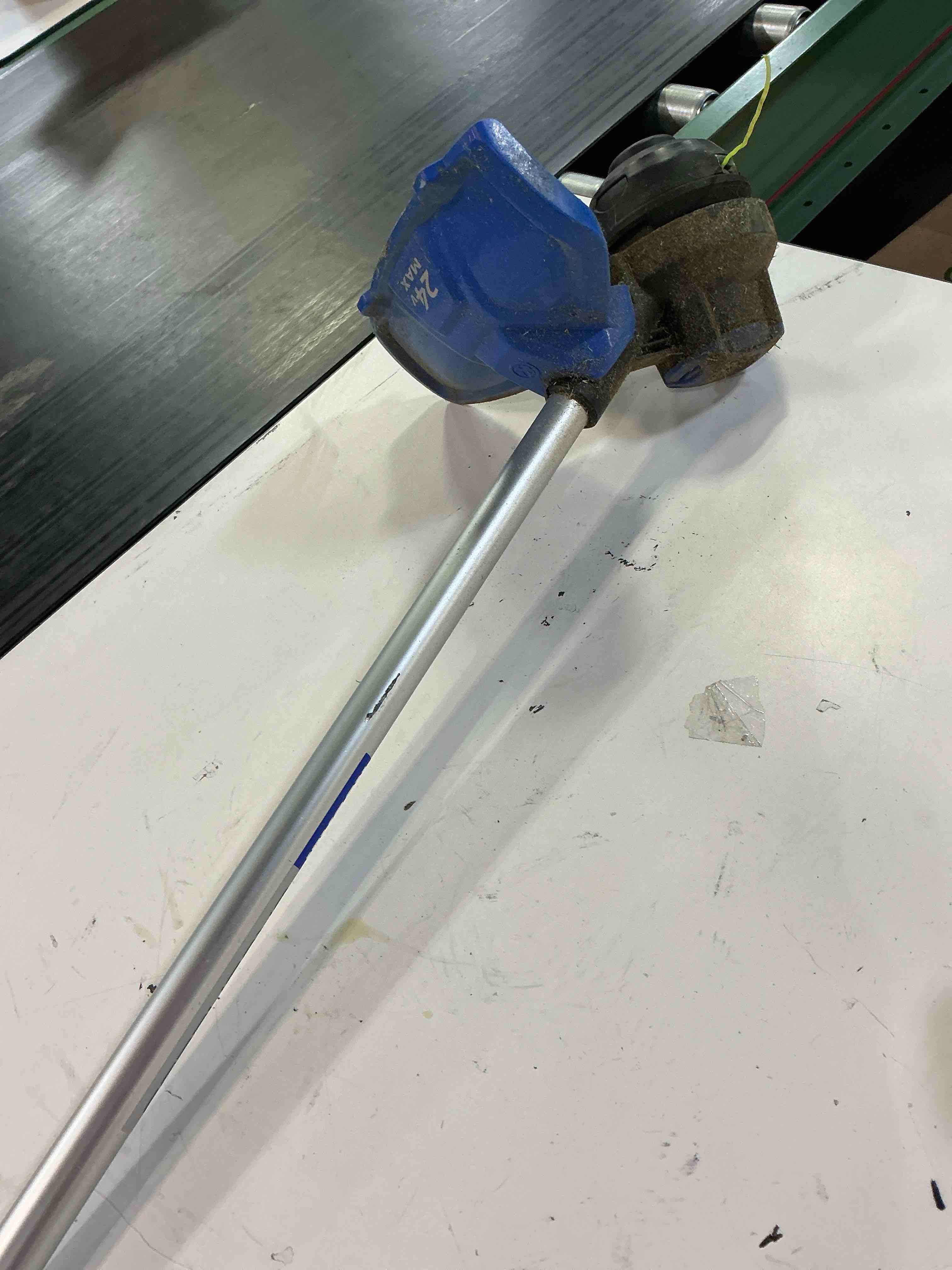 Condition photo showing As Is for kobalt 24-volt 12-in straight shaft battery string trimmer